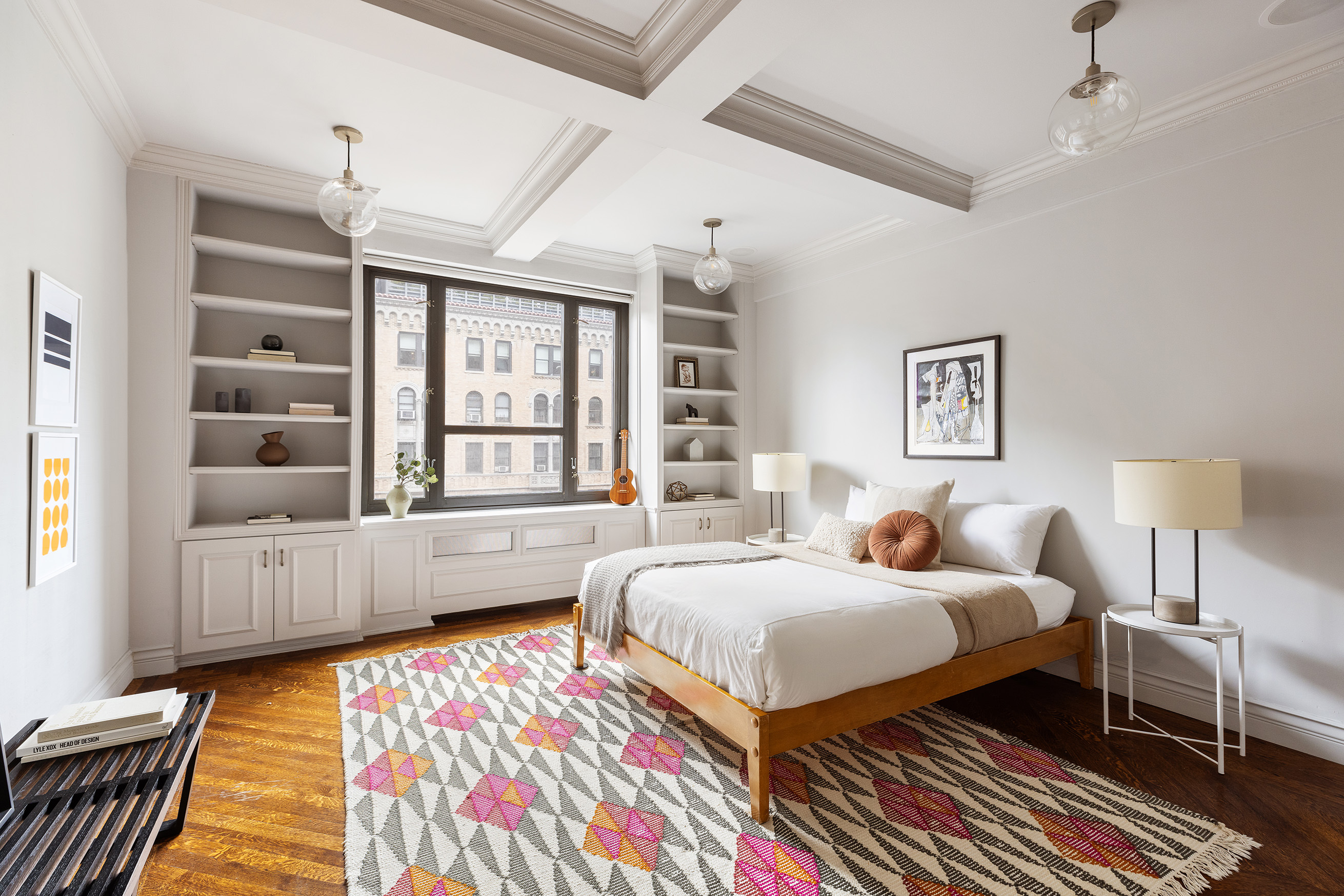 180 East 79th Street, Unit 14G Manhattan, NY 10075 - Photo 7 of 12 a bedroom with beds and a window