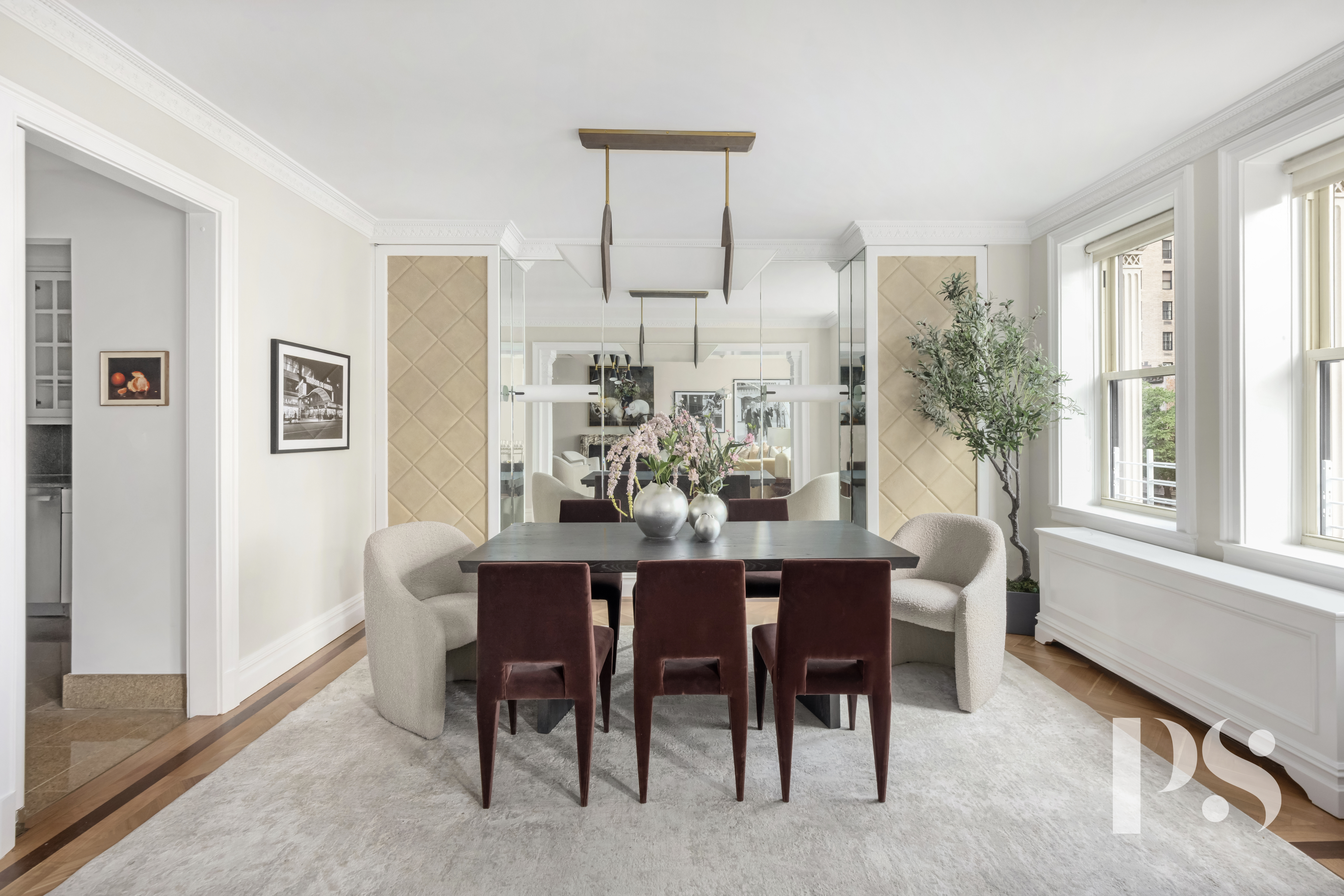 610 Park Avenue, Unit 4B Manhattan, NY 10065 - Photo 8 of 22 a view of a dining room with furniture window and outside view
