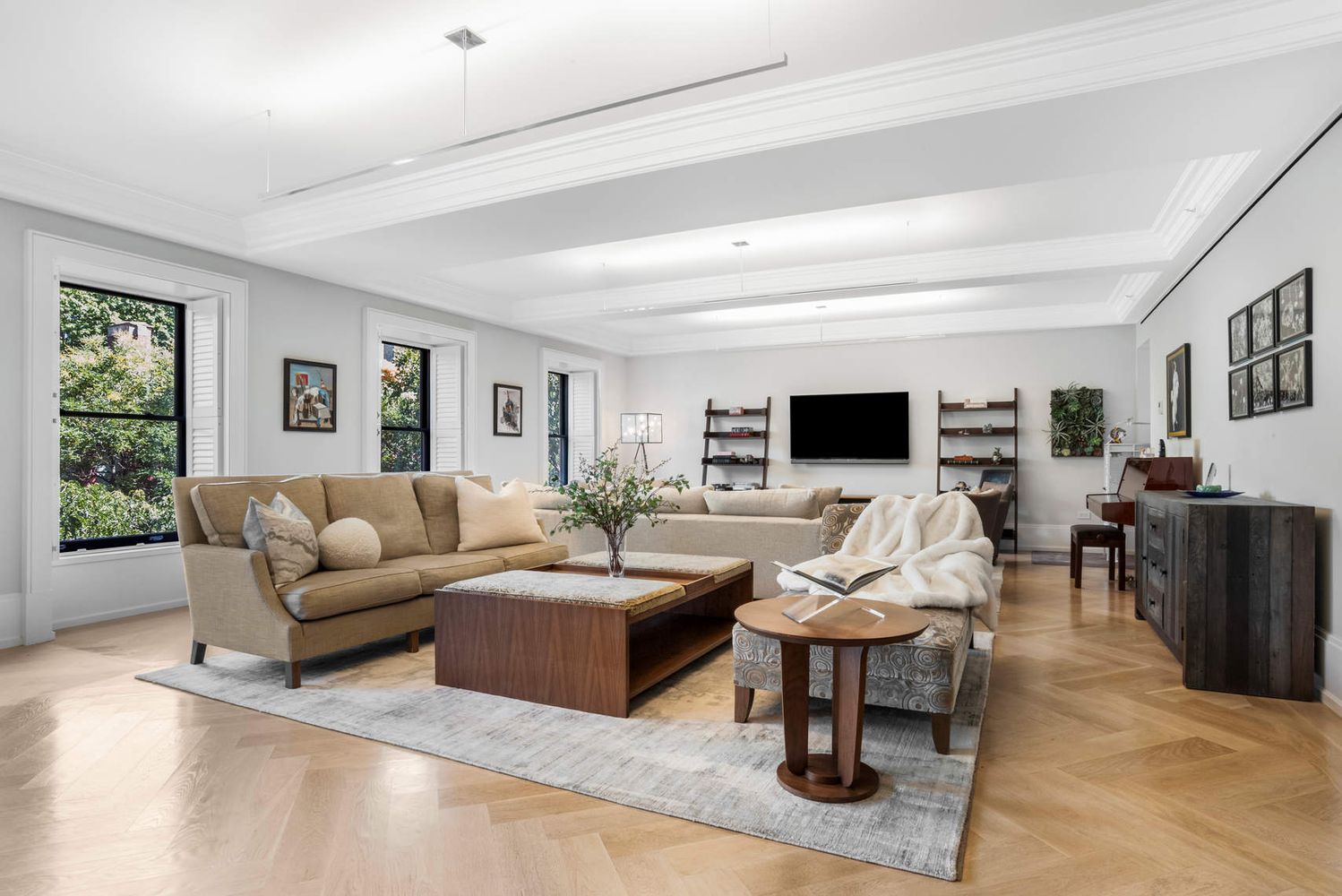 182 West 82nd Street, Unit 4E Manhattan, NY 10024 - Photo 3 of 25 a living room with furniture and a flat screen tv