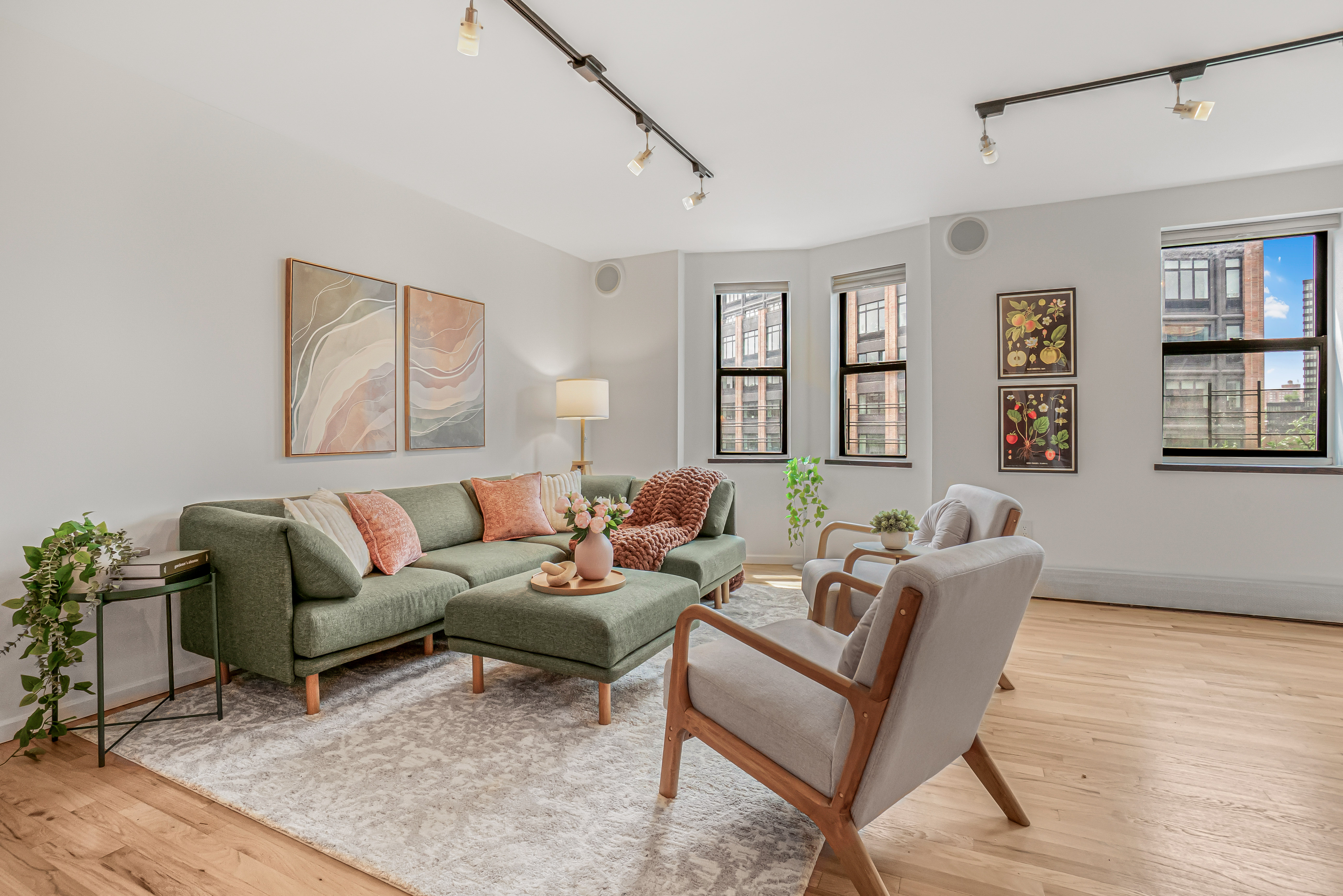 7 Gates Avenue, Unit H Brooklyn, NY 11238 - Photo 5 of 20 a living room with furniture and wooden floor