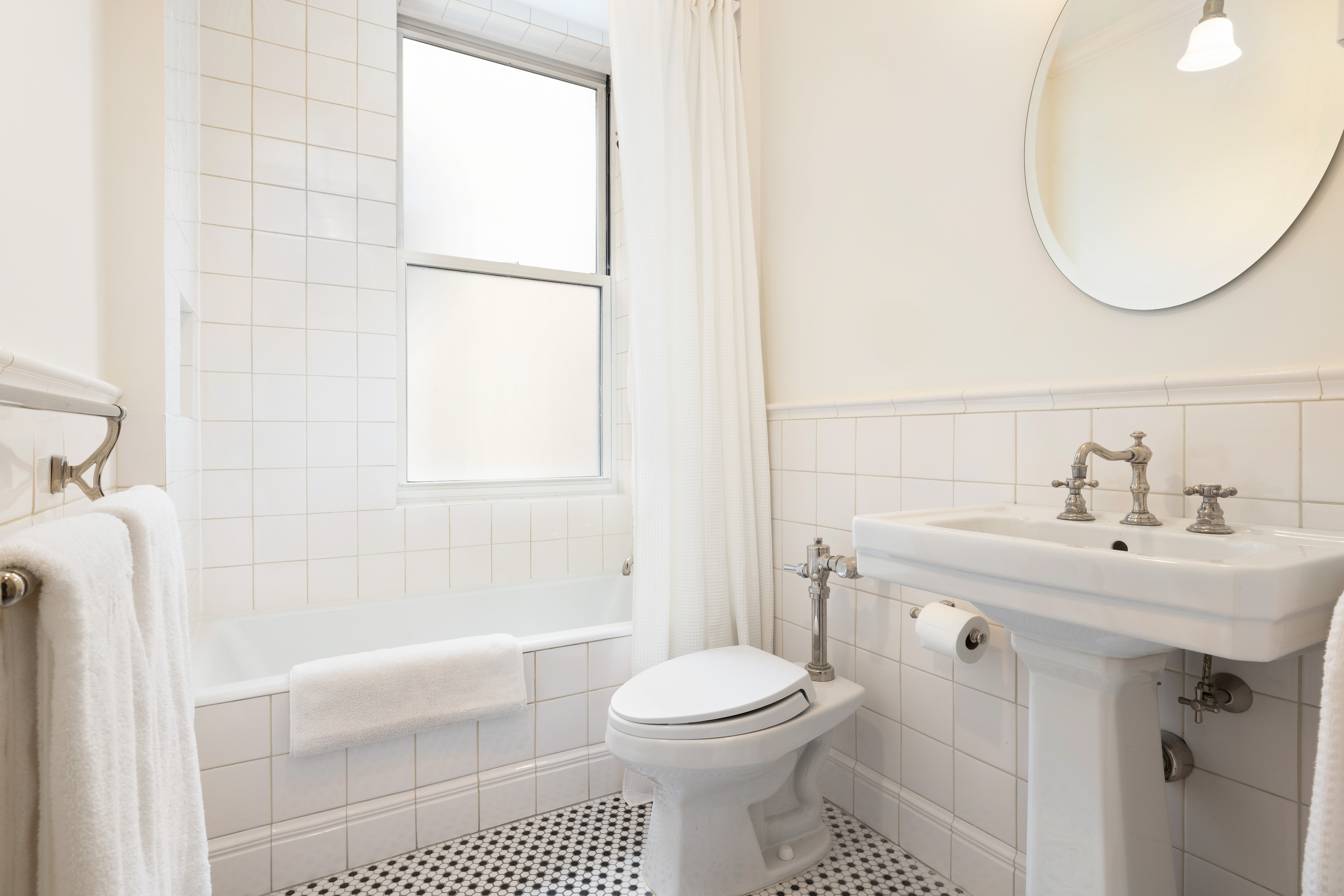 325 West End Avenue, Unit 6AB Manhattan, NY 10023 - Photo 18 of 22 a bathroom with a sink toilet and shower