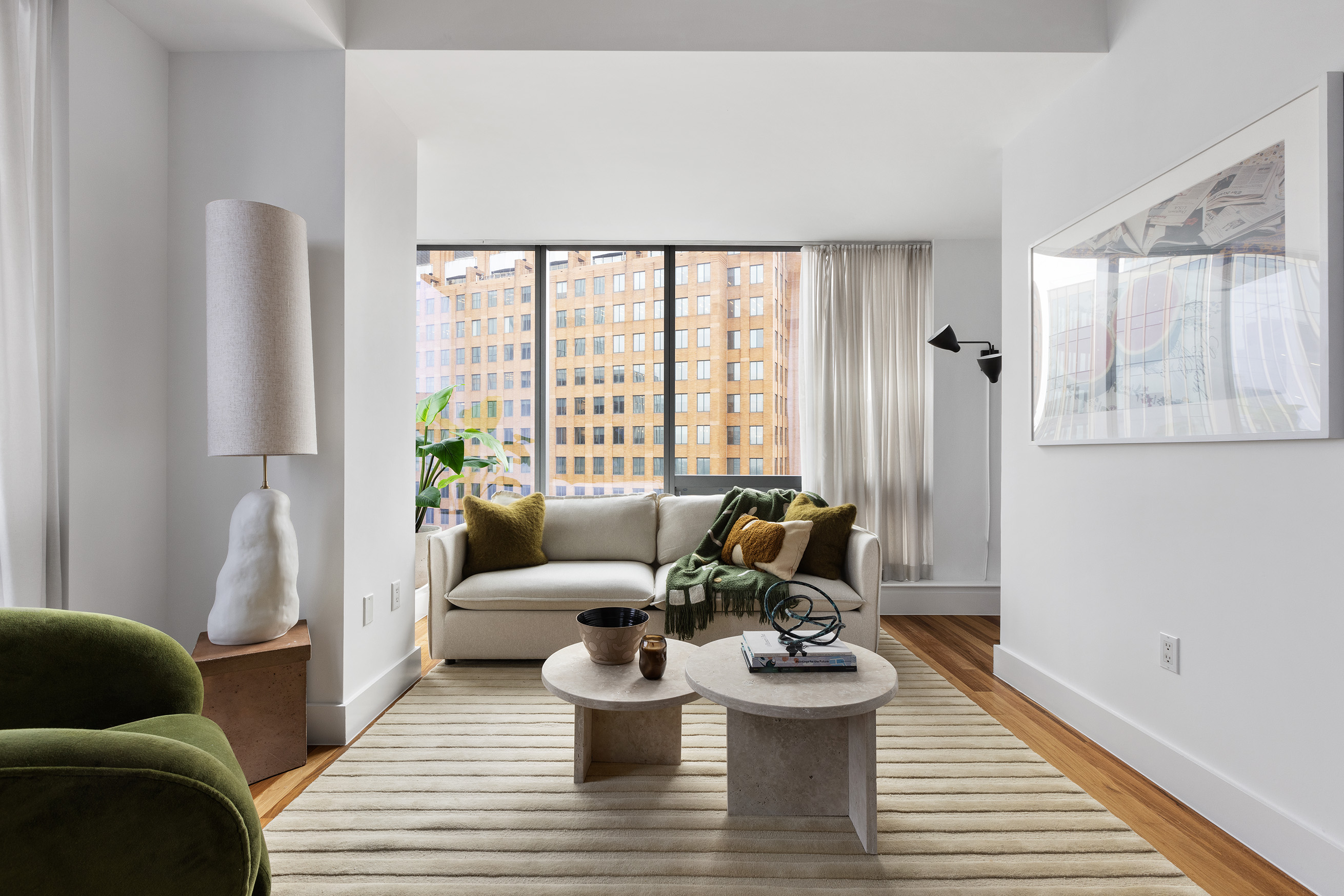 150 Myrtle Avenue, Unit 2506 Brooklyn, NY 11201 - Photo 6 of 16 a living room with furniture and a large window