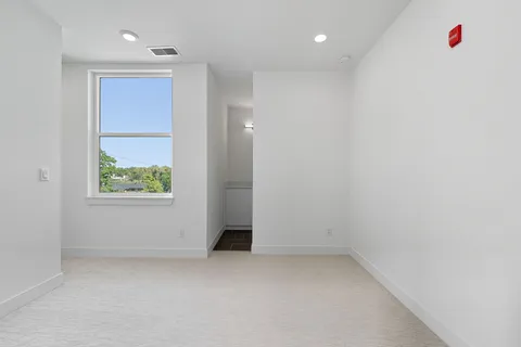 a bathroom with a sink and mirror
