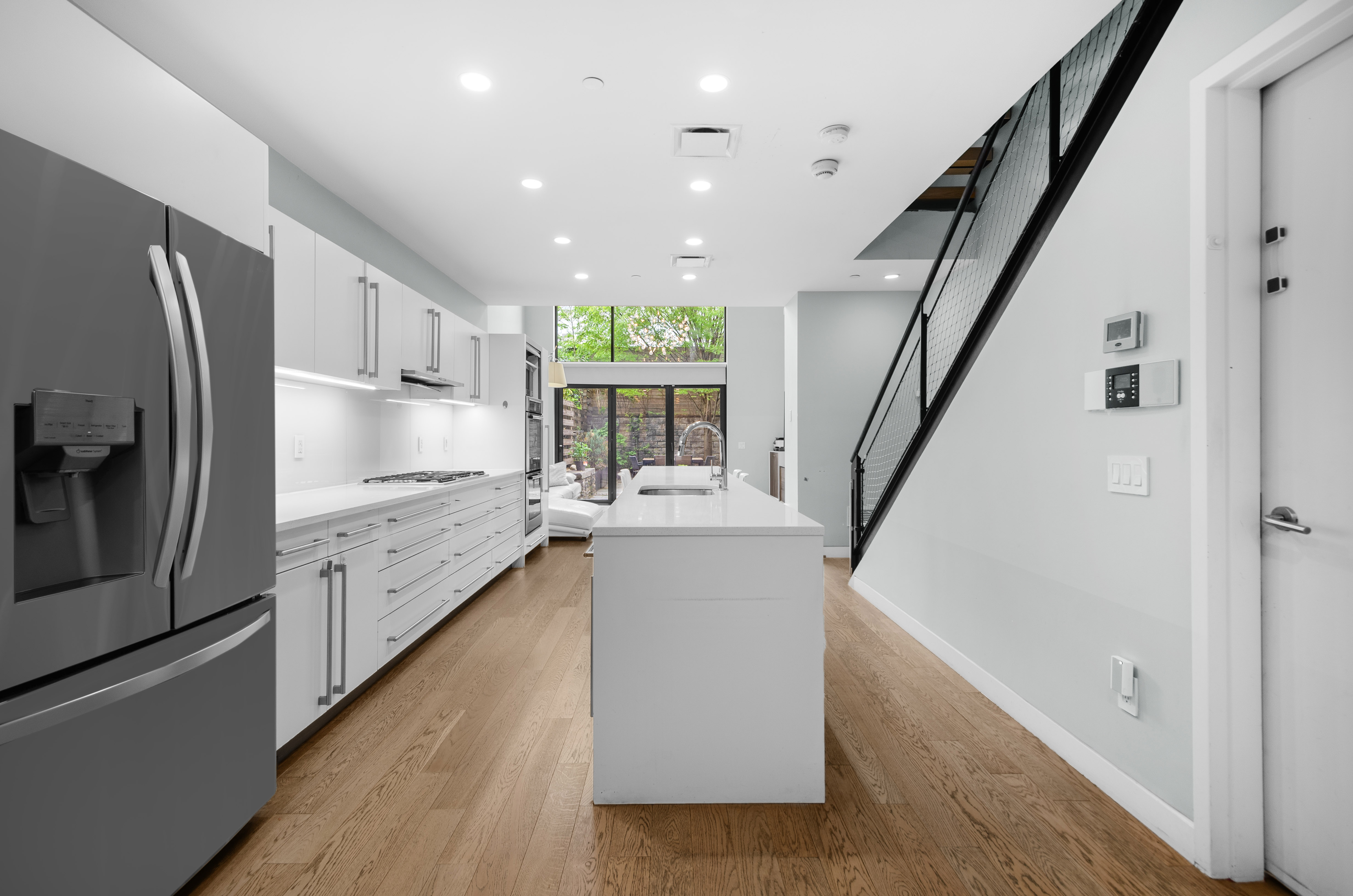 301 State Street Brooklyn, NY 11201 - Photo 2 of 14 a kitchen with counter top oven and refrigerator