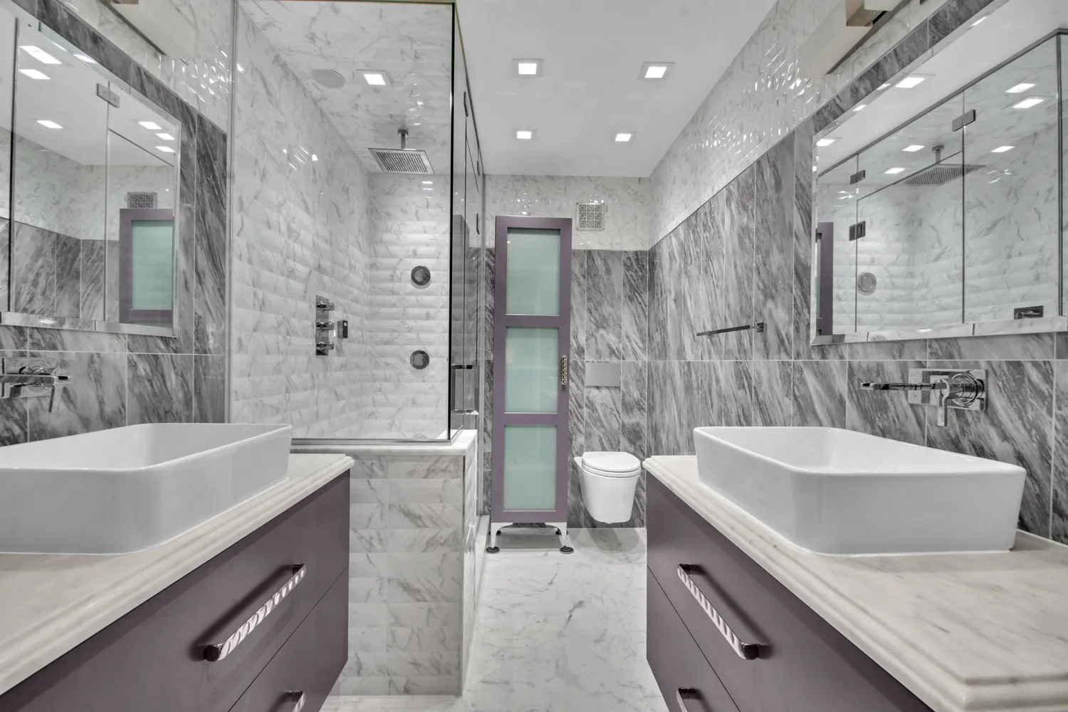 a bedroom with a bed and a potted plant