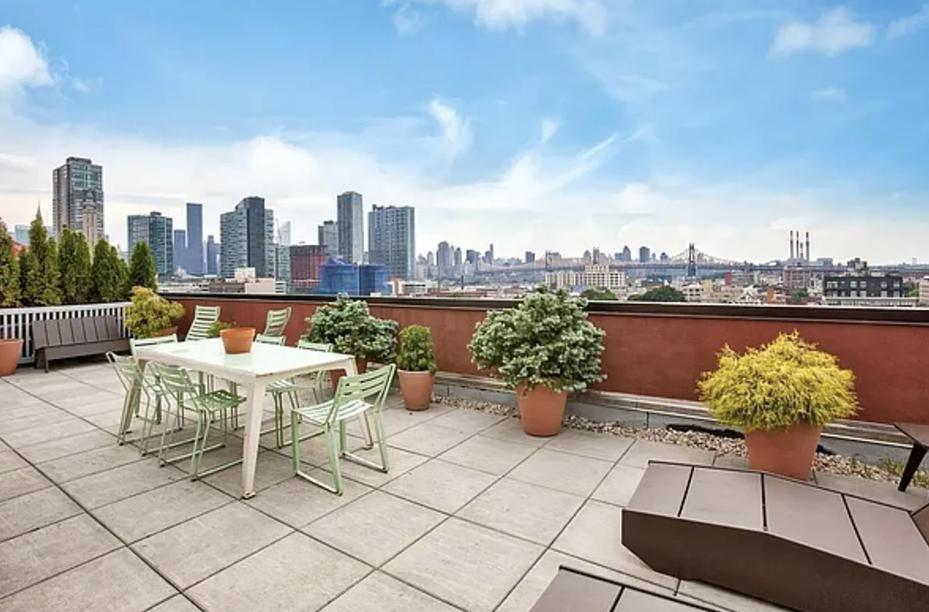 10-63 Jackson Avenue, Unit 7A Queens, NY 11101 - Photo 9 of 11 a view of a terrace with furniture