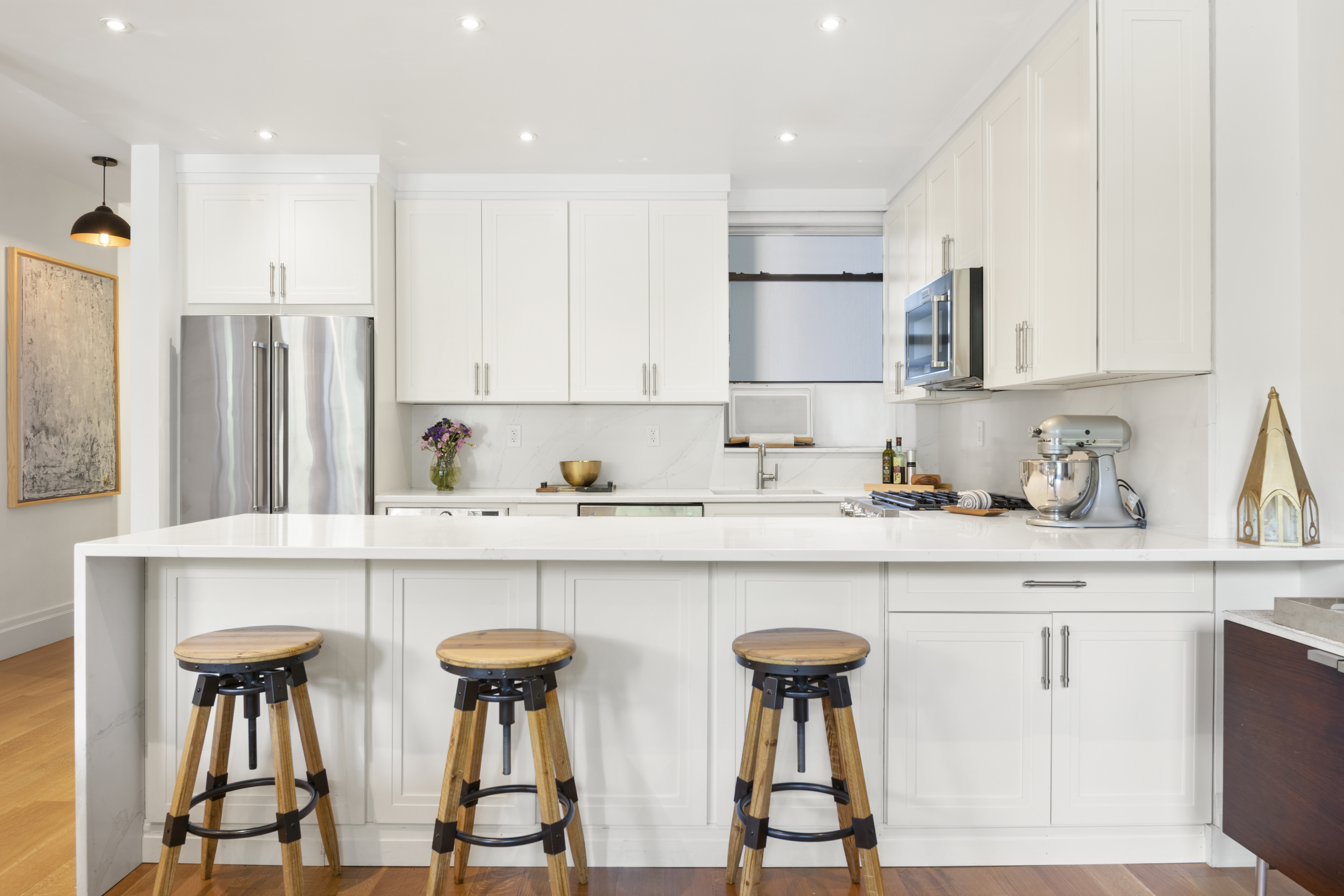 364 West 121st Street, Unit 2A Manhattan, NY 10027 - Photo 3 of 13 a kitchen with stainless steel appliances a sink and cabinets