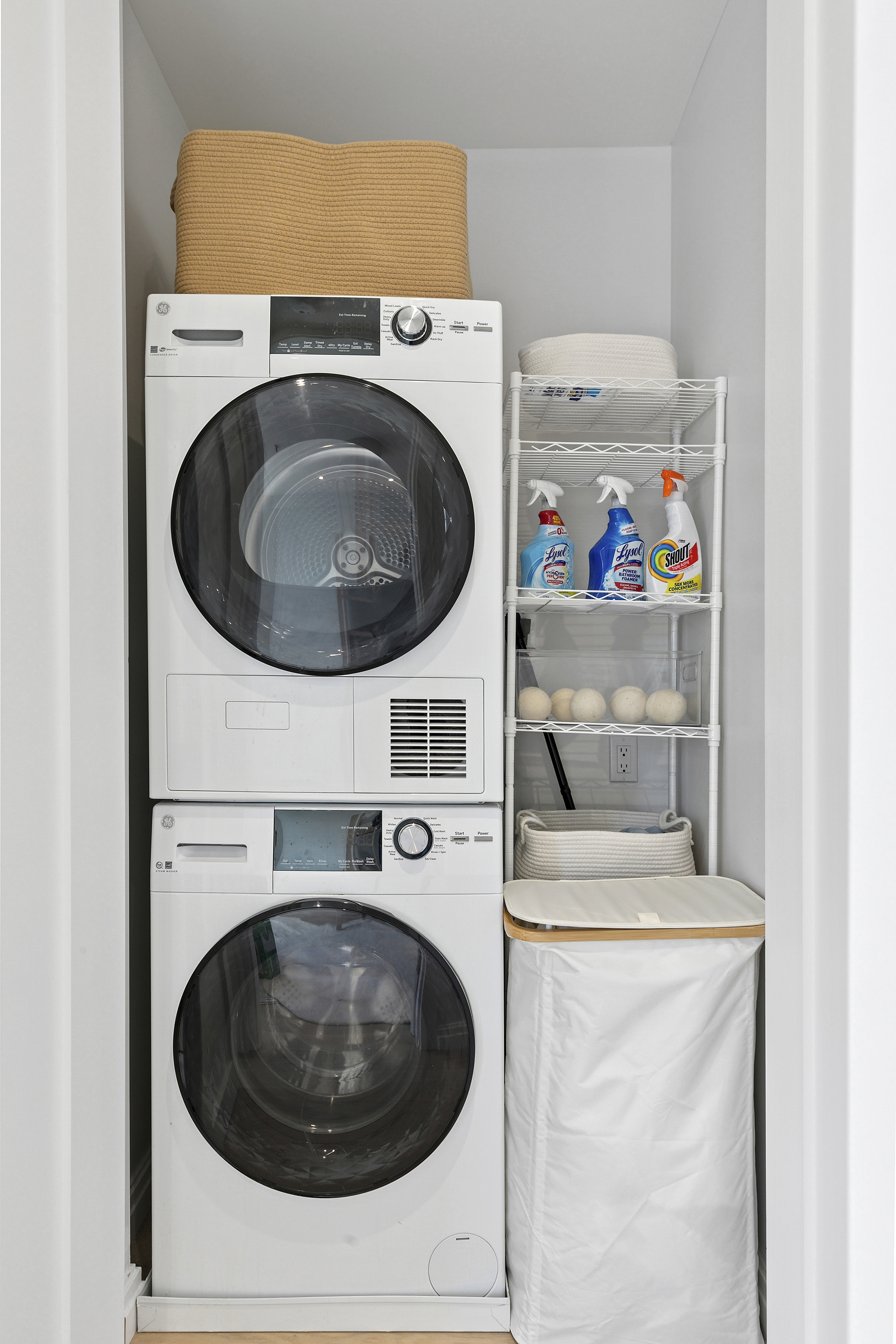 300 East 71st Street, Unit 17DEF Manhattan, NY 10021 - Photo 15 of 16 a utility room with dryer and washer