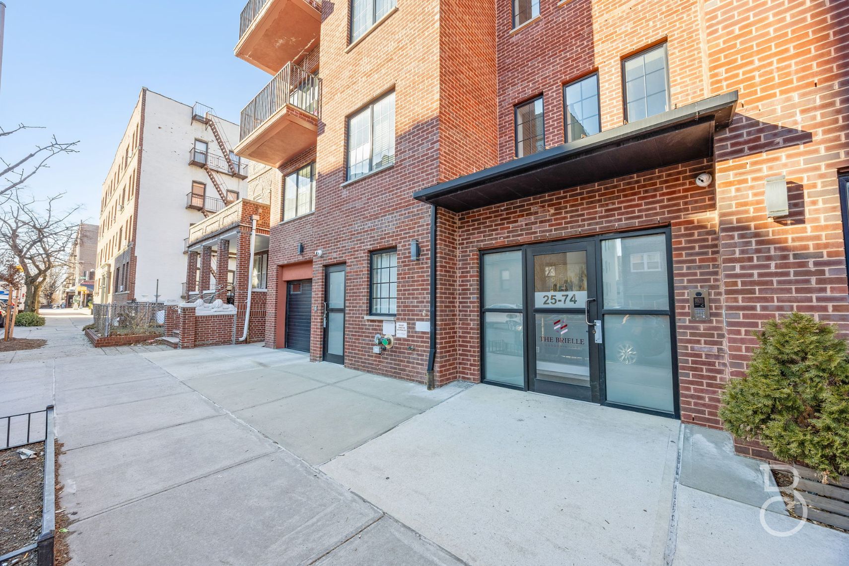 25-74 34th Street, Unit 4C Queens, NY 11103 - Photo 15 of 15 a view of a brick building with many windows