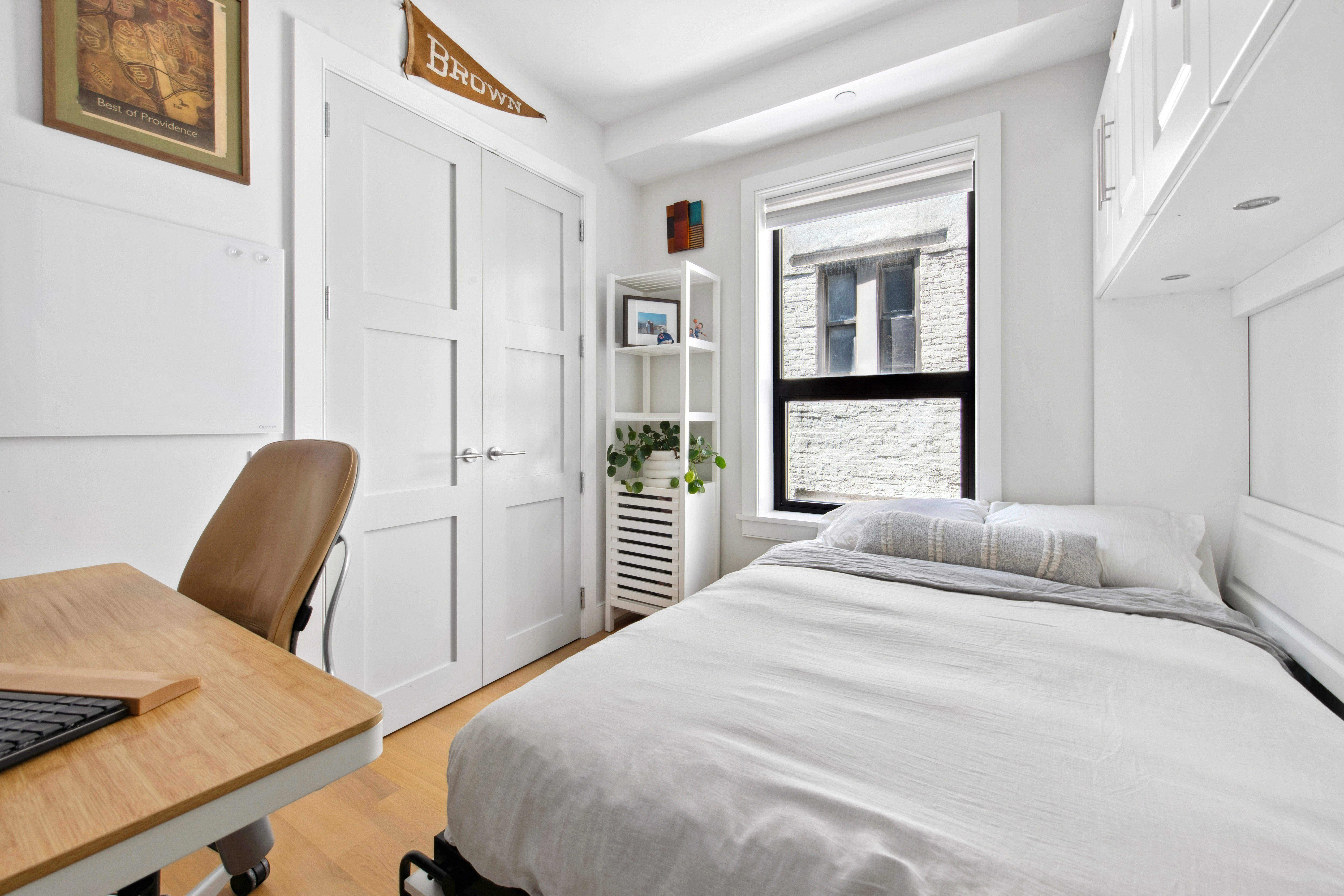 536 East 13th Street, Unit 5F Manhattan, NY 10009 - Photo 10 of 16 a bedroom with a bed and wooden floor