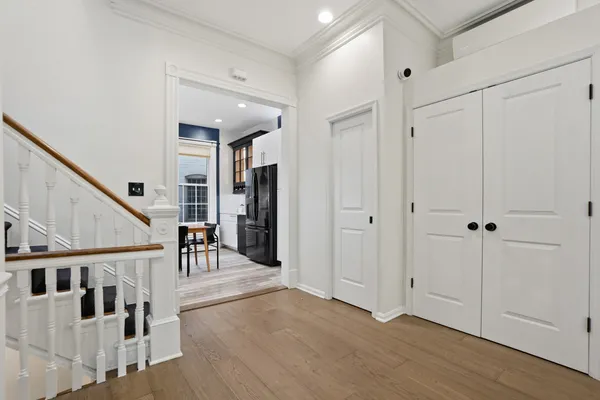 a view of entryway with dining room and stairs