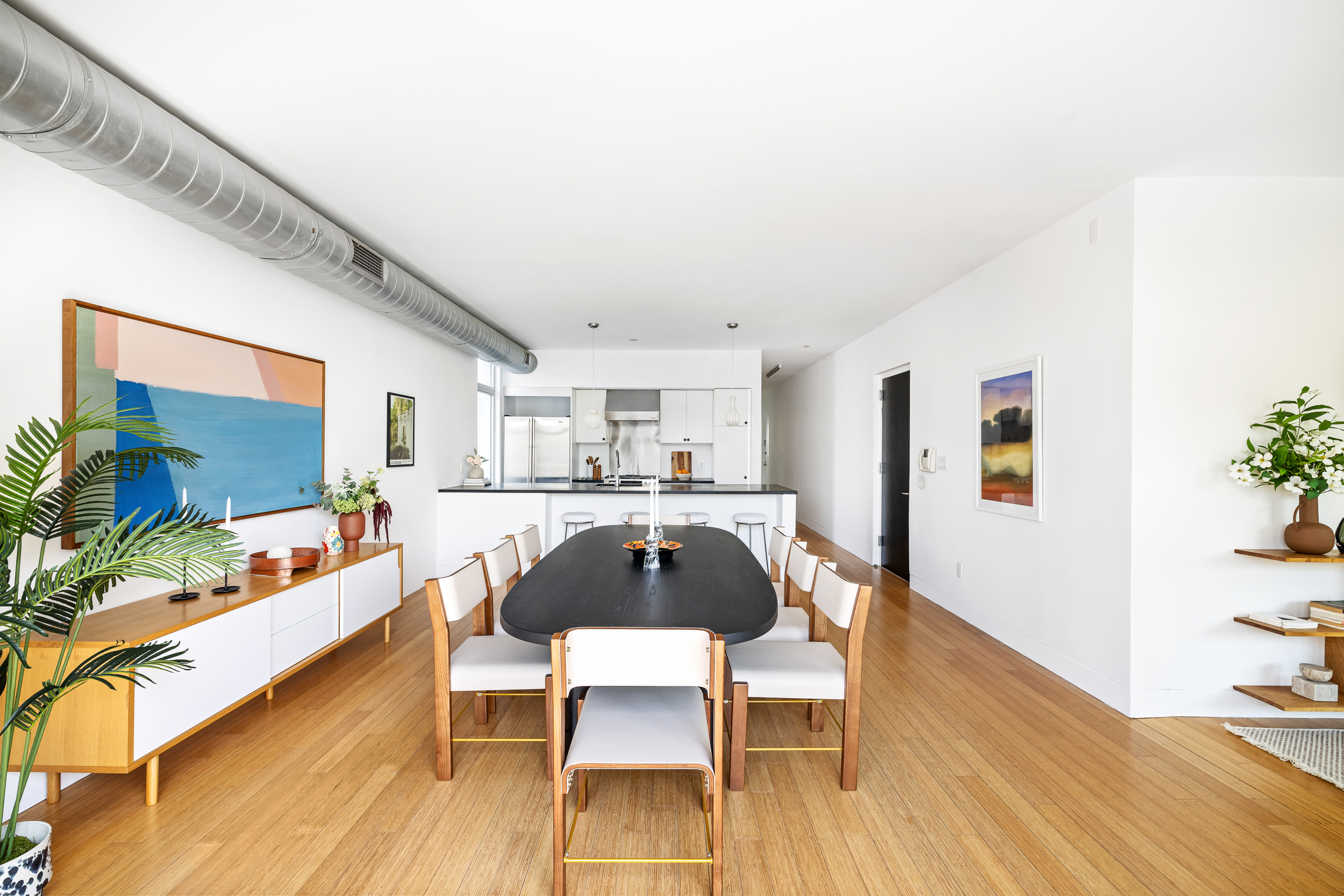 361 Manhattan Avenue, Unit 3AB Brooklyn, NY 11211 - Photo 3 of 21 a dining room with furniture and wooden floor