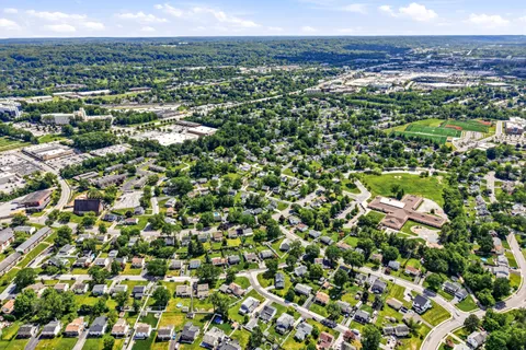 an aerial view of a house with a garden