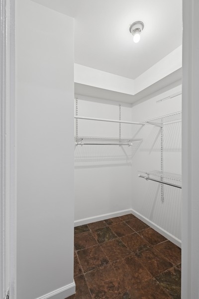 189 Avenue C, Unit 4D Manhattan, NY 10009 - Photo 12 of 17 a view of a room with empty racks