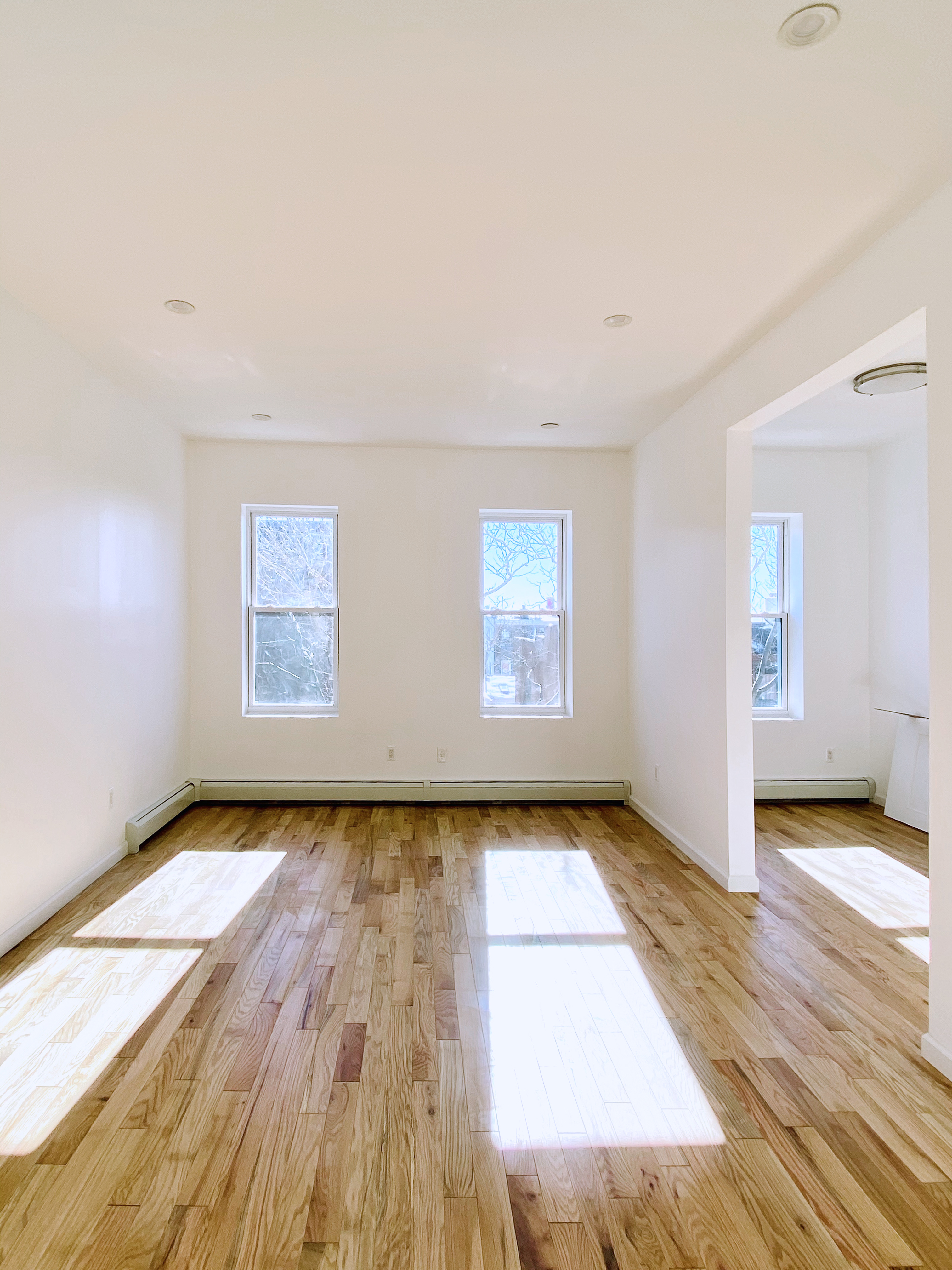 175 Luquer Street, Unit 4 Brooklyn, NY 11231 - Photo 19 of 21 a view of a room with wooden floor and a window