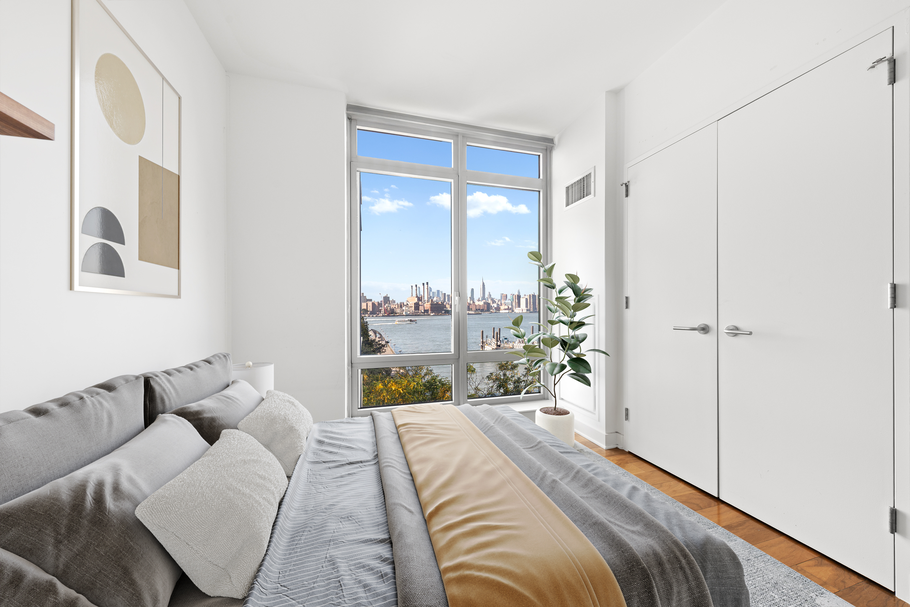 Brooklyn, NY 11249 - Photo 8 of 21 a bedroom with a large bed and a chandelier
