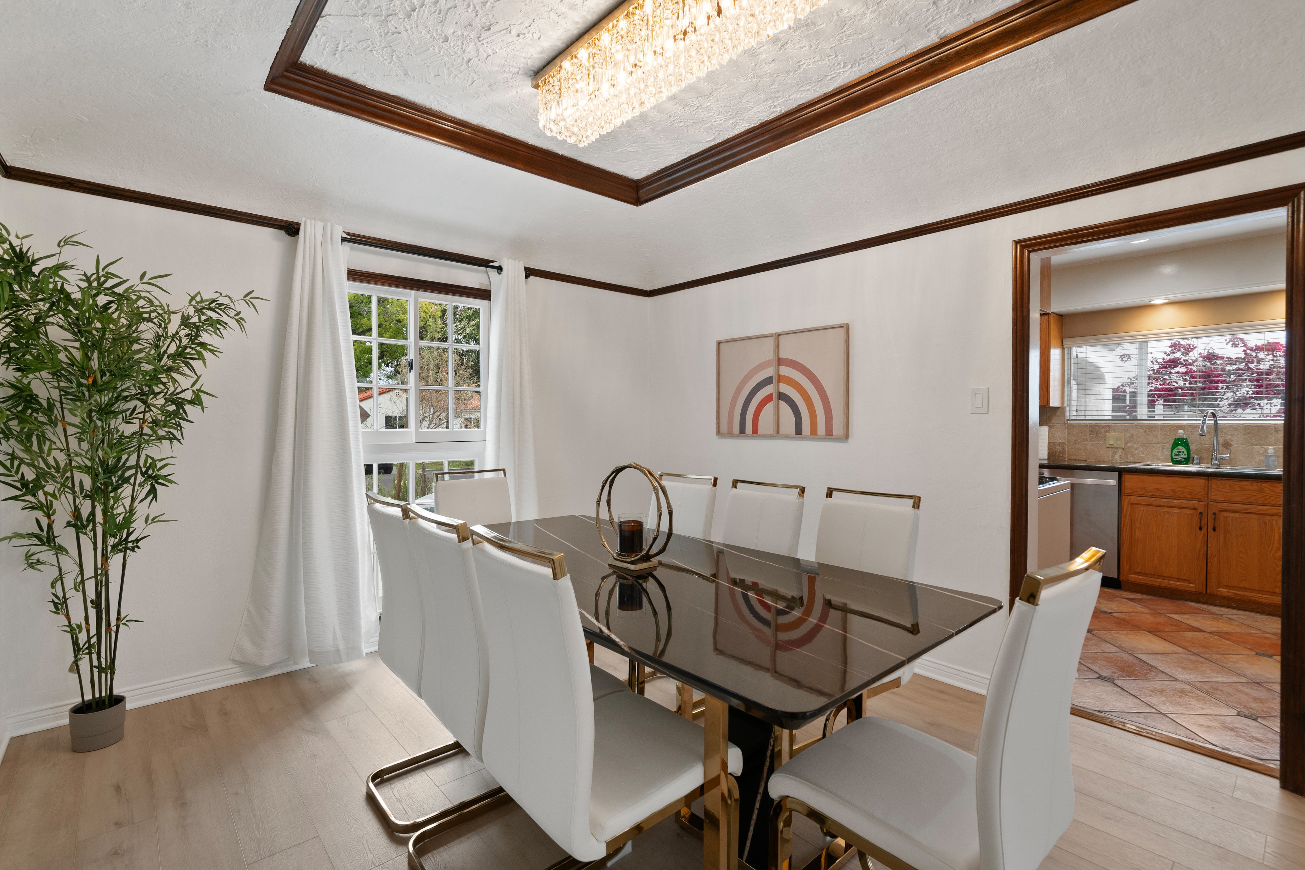 8832 Horner Street Los Angeles, CA 90035 - Photo 6 of 24 a view of a dining room with furniture window and wooden floor