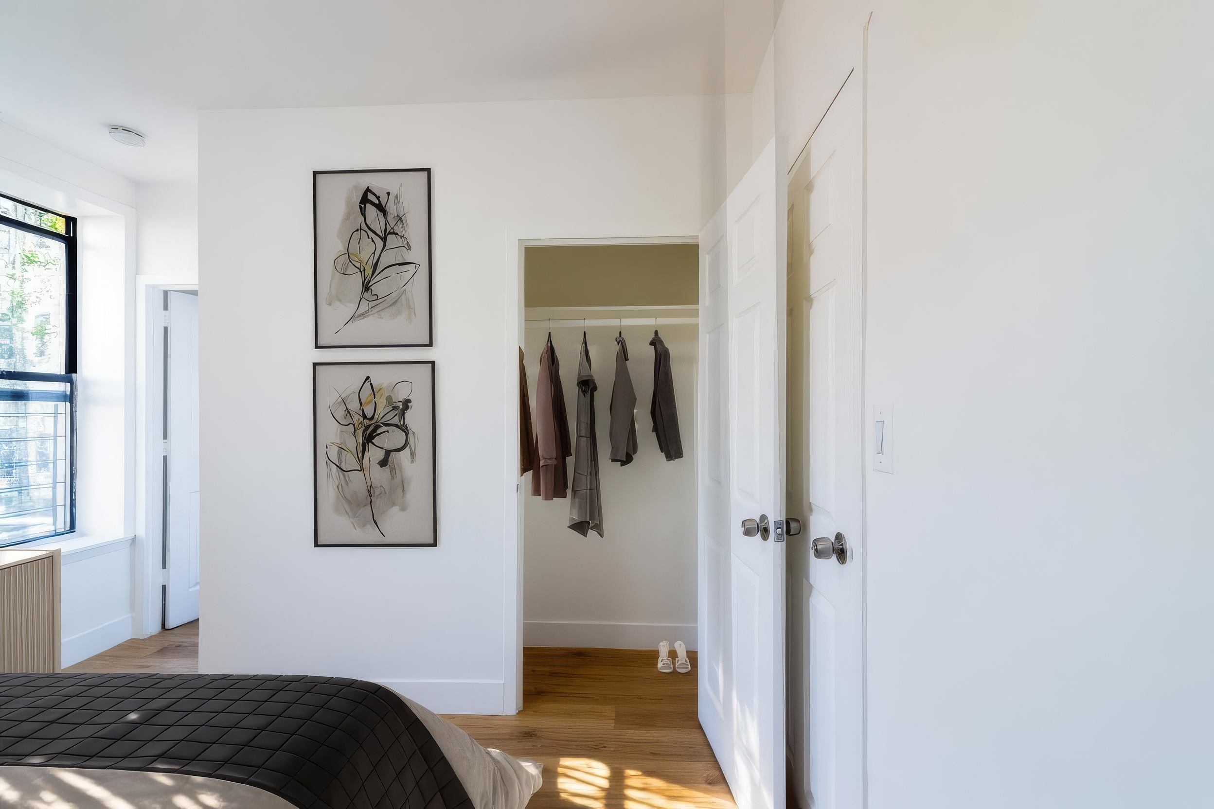 517 West 144th Street, Unit 9 Manhattan, NY 10031 - Photo 3 of 22 a bedroom with a bed and a window