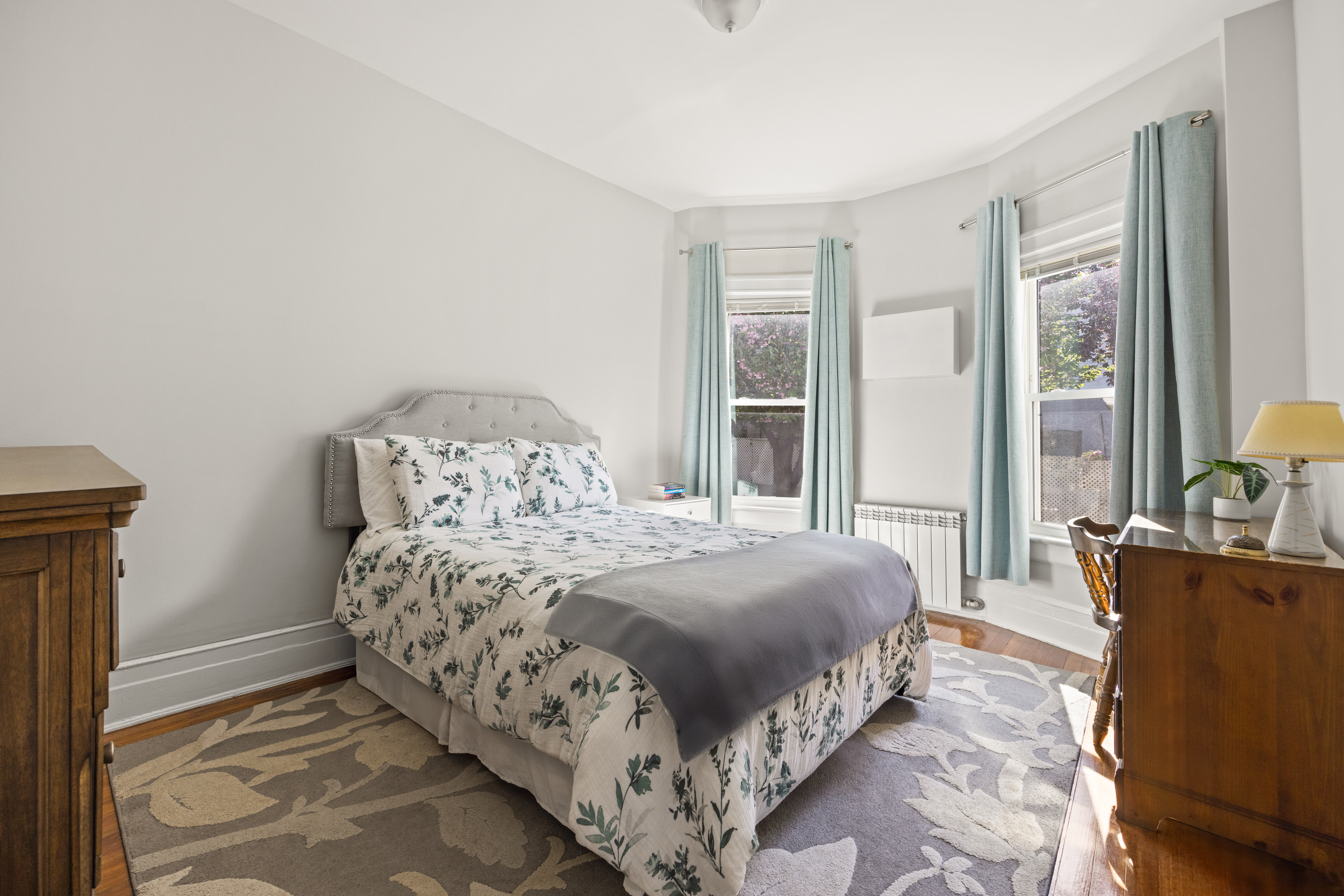 758 Westminster Road Brooklyn, NY 11230 - Photo 24 of 32 a bedroom with a bed and wooden floor