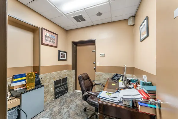 a picture of a bench in a building