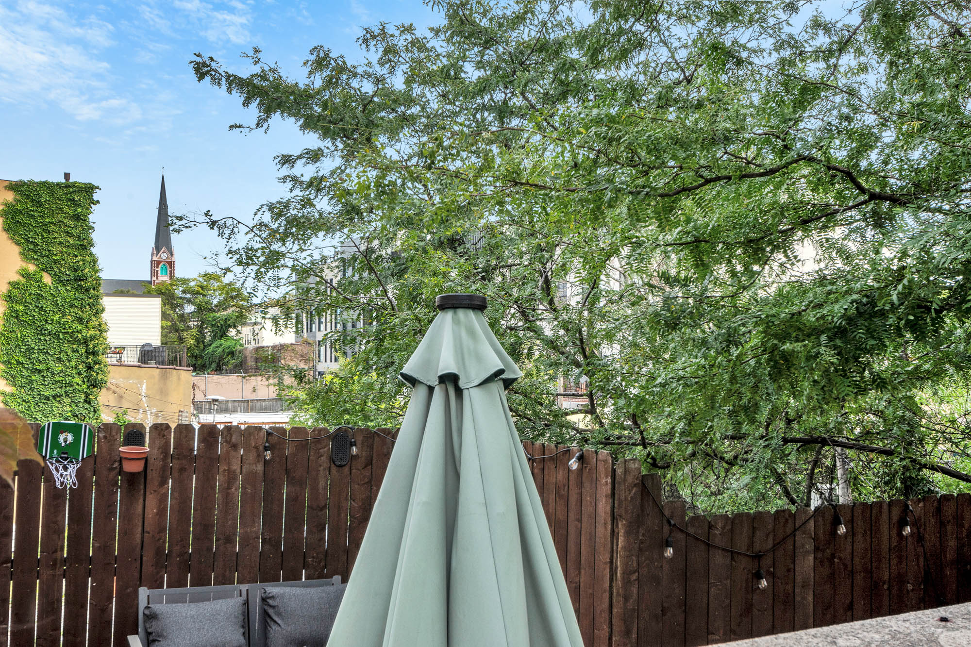 10 Carroll Street Brooklyn, NY 11231 - Photo 25 of 28 a backyard of a house with lots of green space