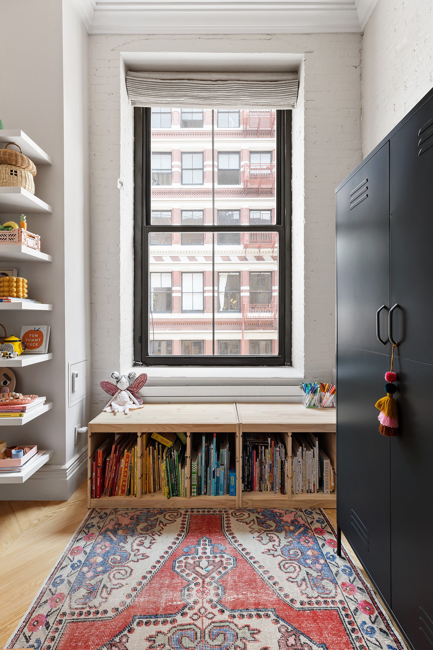 35 Mercer Street, Unit 3E Manhattan, NY 10013 - Photo 19 of 21 a living room with furniture and a window