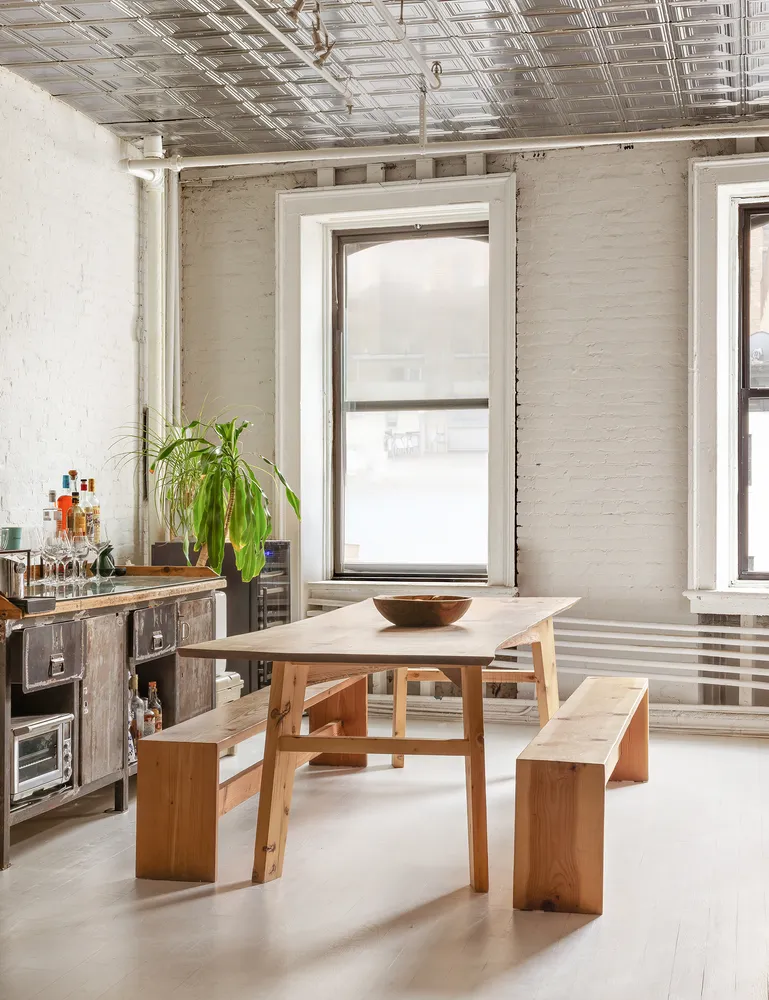 a living room with furniture and window