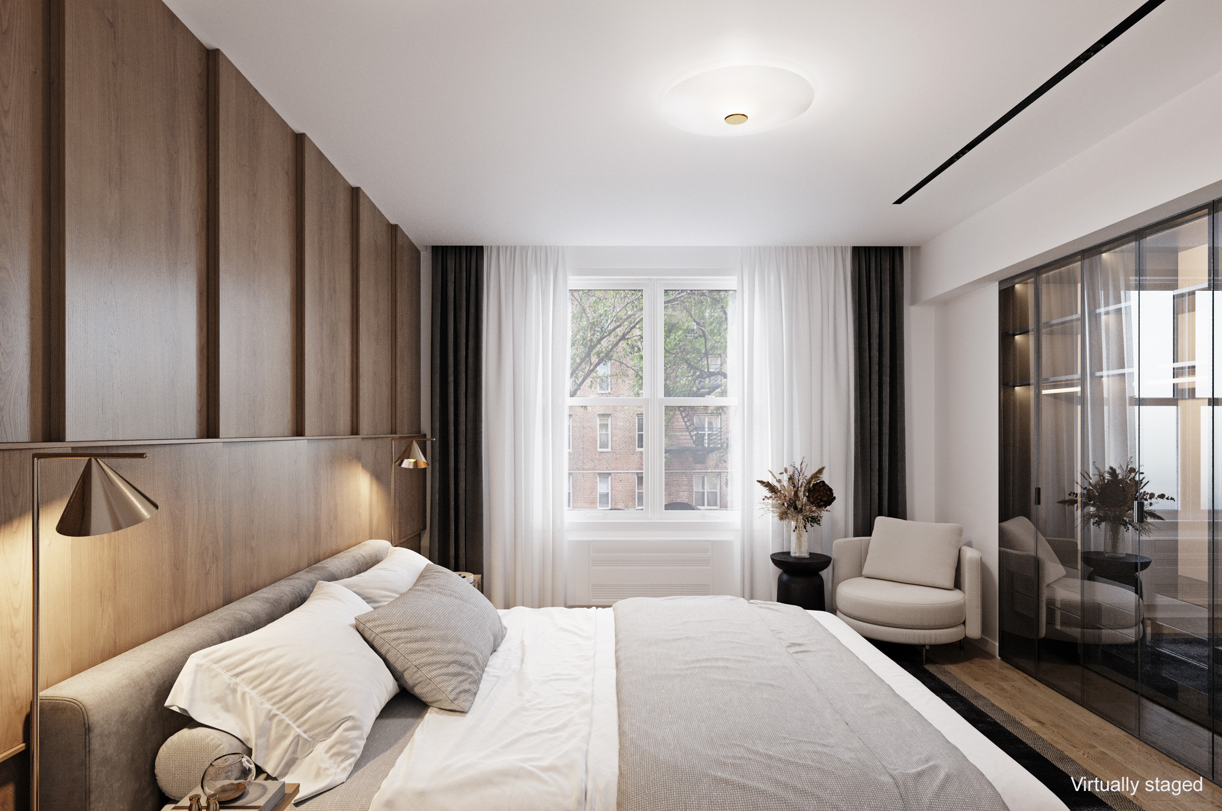 408 West 34th Street, Unit 1F Manhattan, NY 10001 - Photo 7 of 13 a bedroom with a large bed and a large window