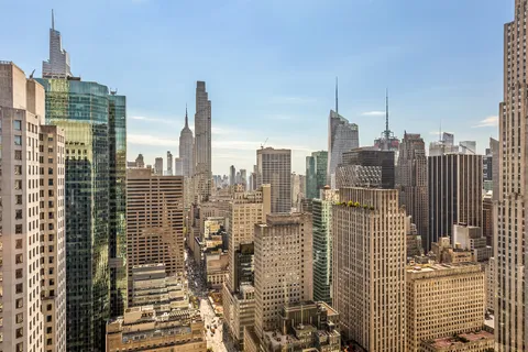 a view of city with tall buildings