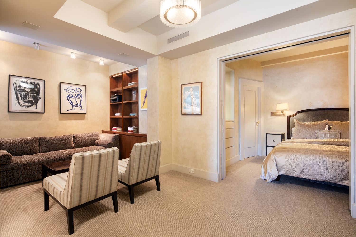 a bedroom with furniture and window