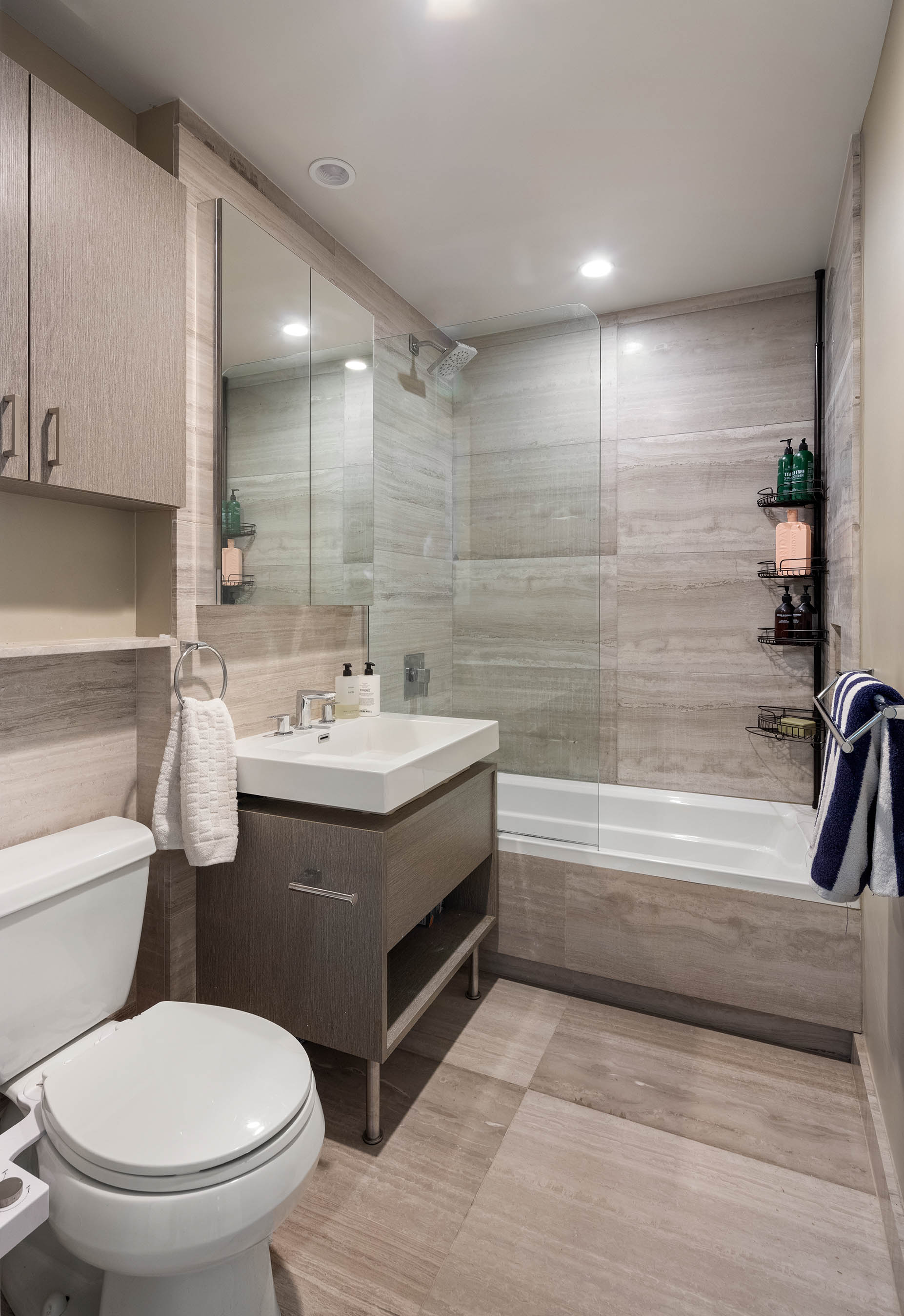 184 India Street, Unit 4B Brooklyn, NY 11222 - Photo 5 of 6 a bathroom with a sink toilet and shower