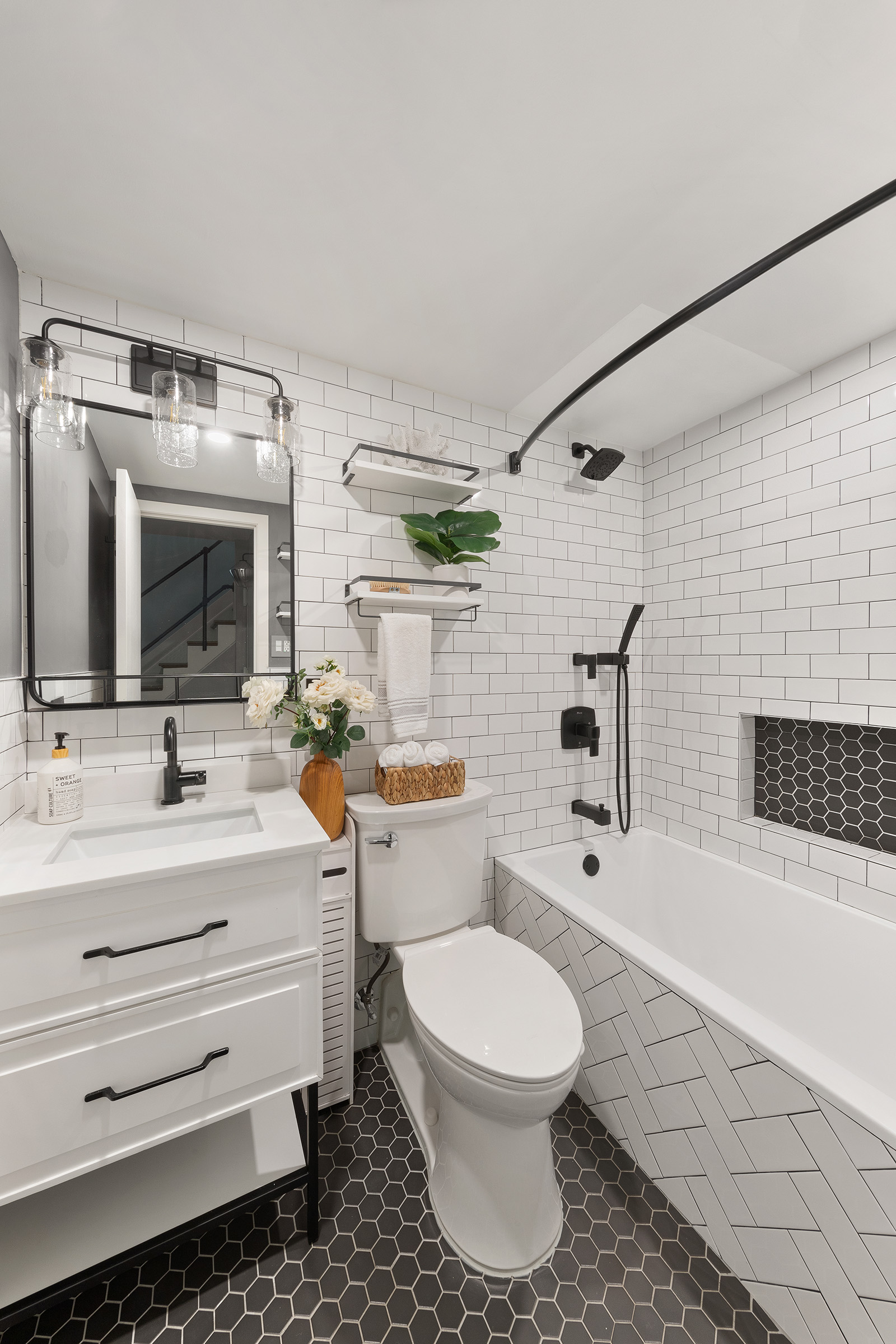 113 Prospect Park Southwest, Unit 12 Brooklyn, NY 11218 - Photo 7 of 13 a bathroom with a sink a toilet and shower