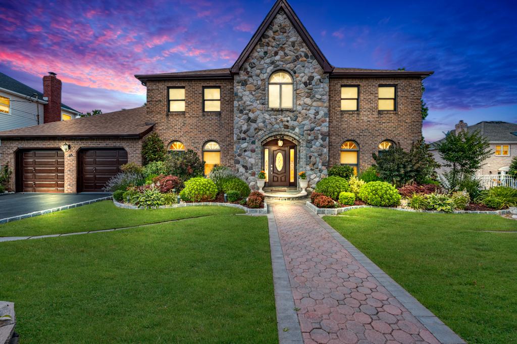 35 Poe Street Staten Island, NY 10307 - Photo 2 of 36 a front view of a house with garden
