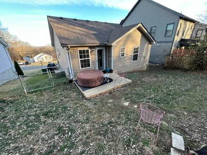 a house view with a backyard space