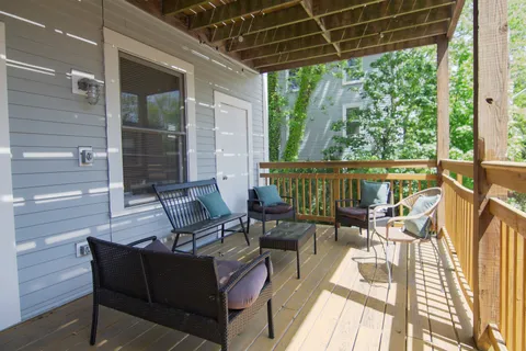 a building outdoor space with patio furniture