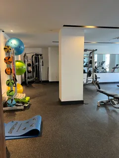 a view of room with gym equipment