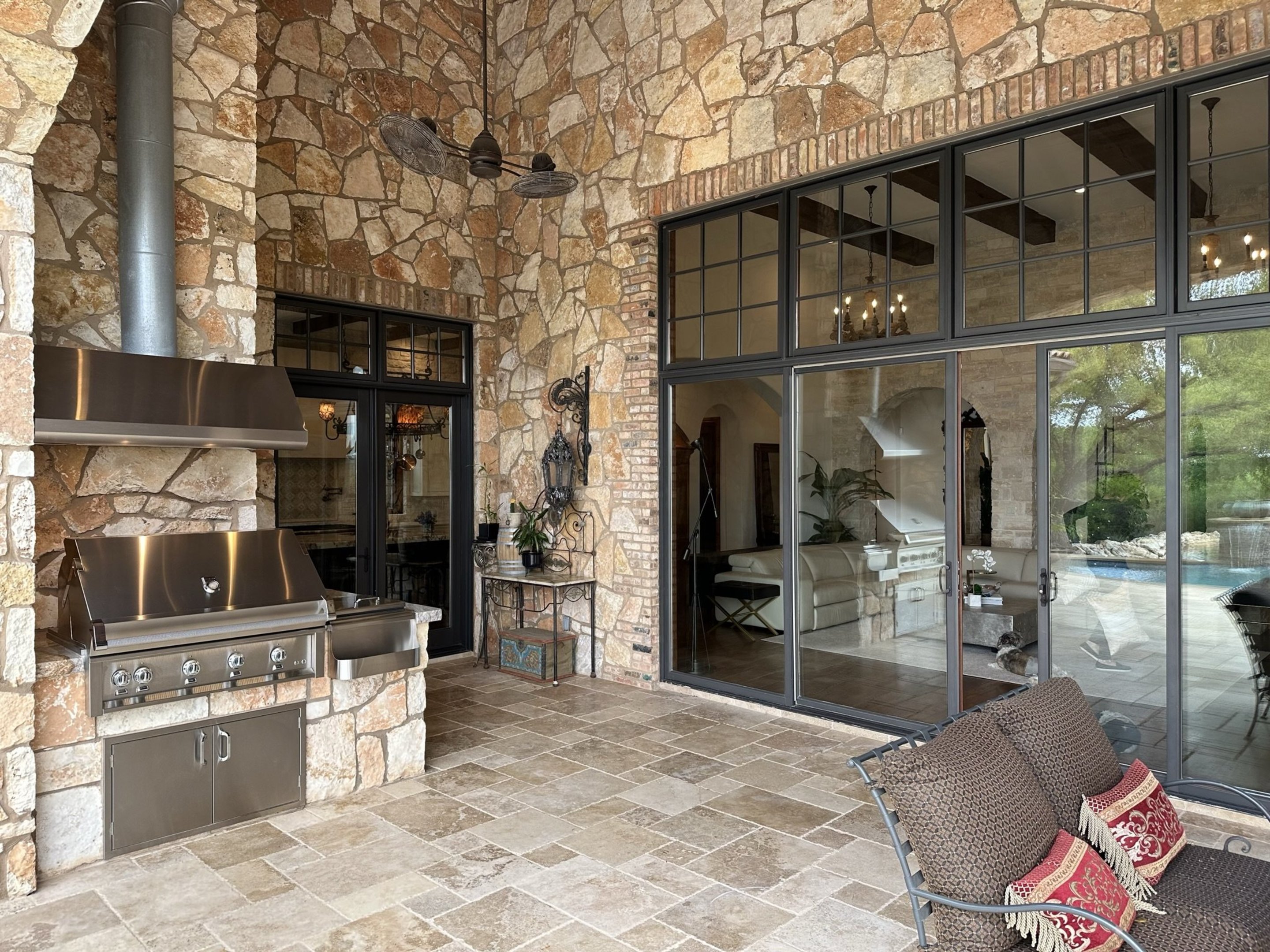 808 Rivercliff Drive Spicewood, TX 78669 - Photo 30 of 71 a view of a chairs and a table in the patio