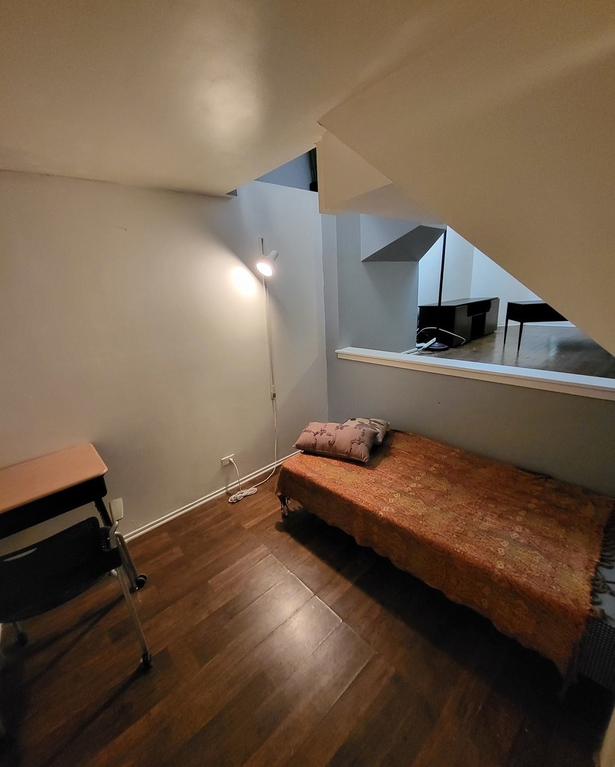 6337 Roosevelt Road, Unit 105 Berwyn, IL 60402 - Photo 12 of 21 a room with pool table and wooden floor