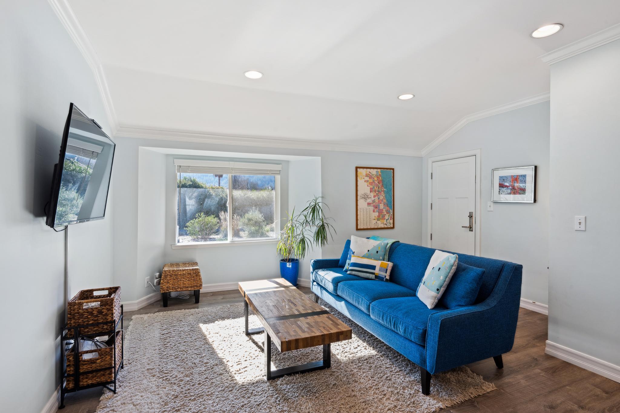 123 Frey Road Santa Rosa, CA 95409 - Photo 45 of 62 a living room with furniture and a flat screen tv