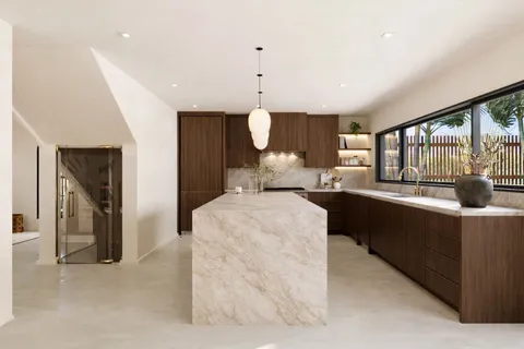 a large white kitchen with a large window