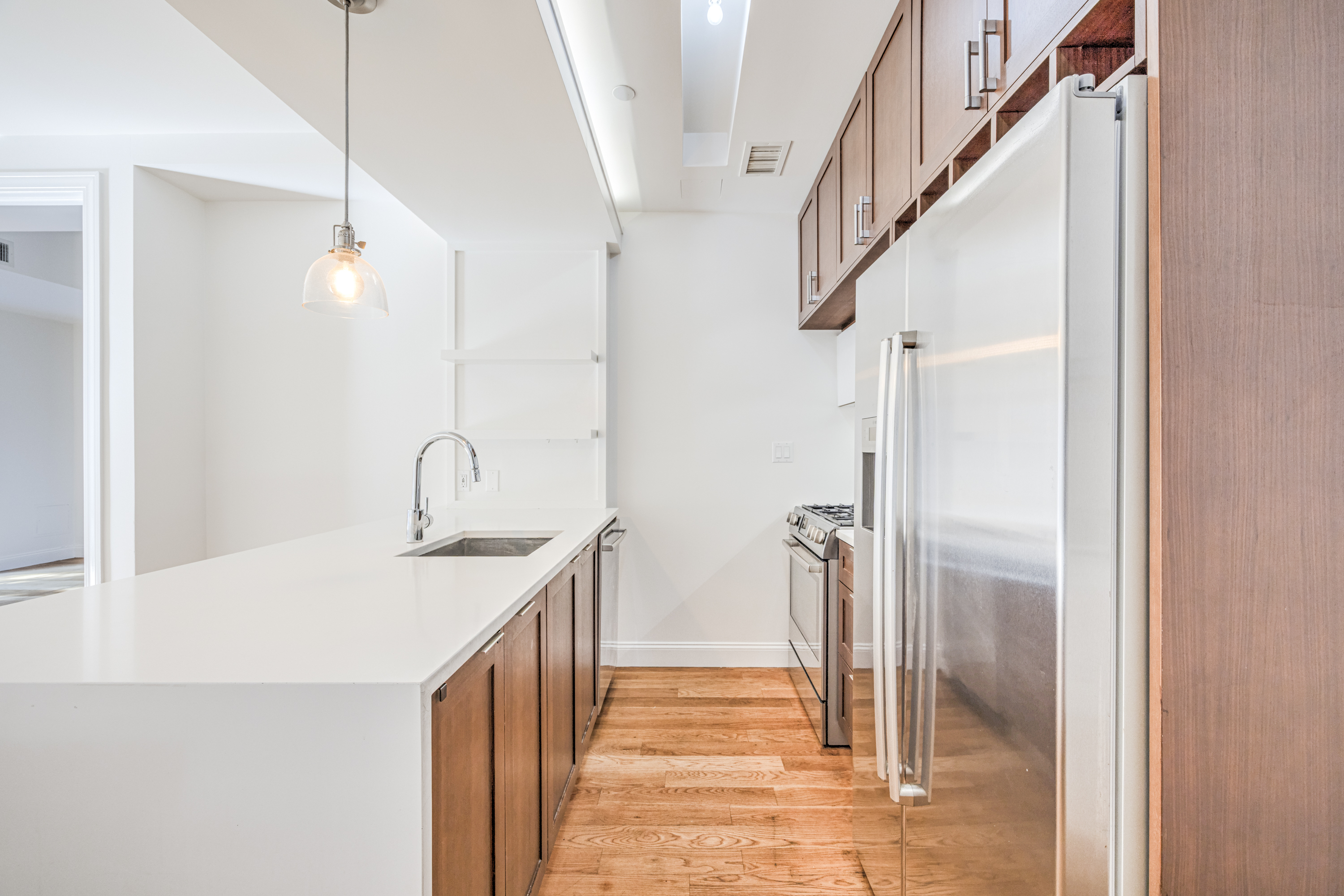 42 Maspeth Avenue, Unit 1D Brooklyn, NY 11211 - Photo 15 of 28 a bathroom with a sink and mirror