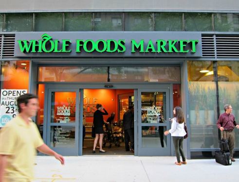 252 7th Avenue, Unit 9X Manhattan, NY 10001 - Photo 25 of 26 a group of people sitting in front of retail shop