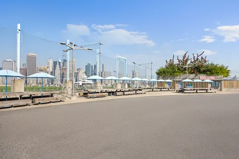 a view of a street with a building in the background