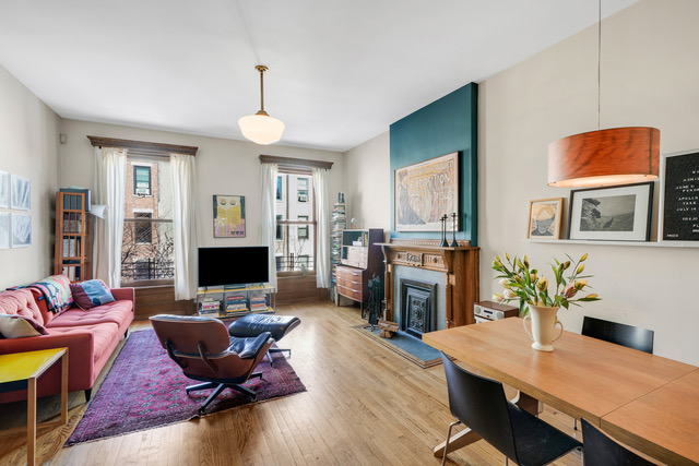 347 West 121st Street Manhattan, NY 10027 - Photo 5 of 16 a living room with furniture fireplace and a flat screen tv