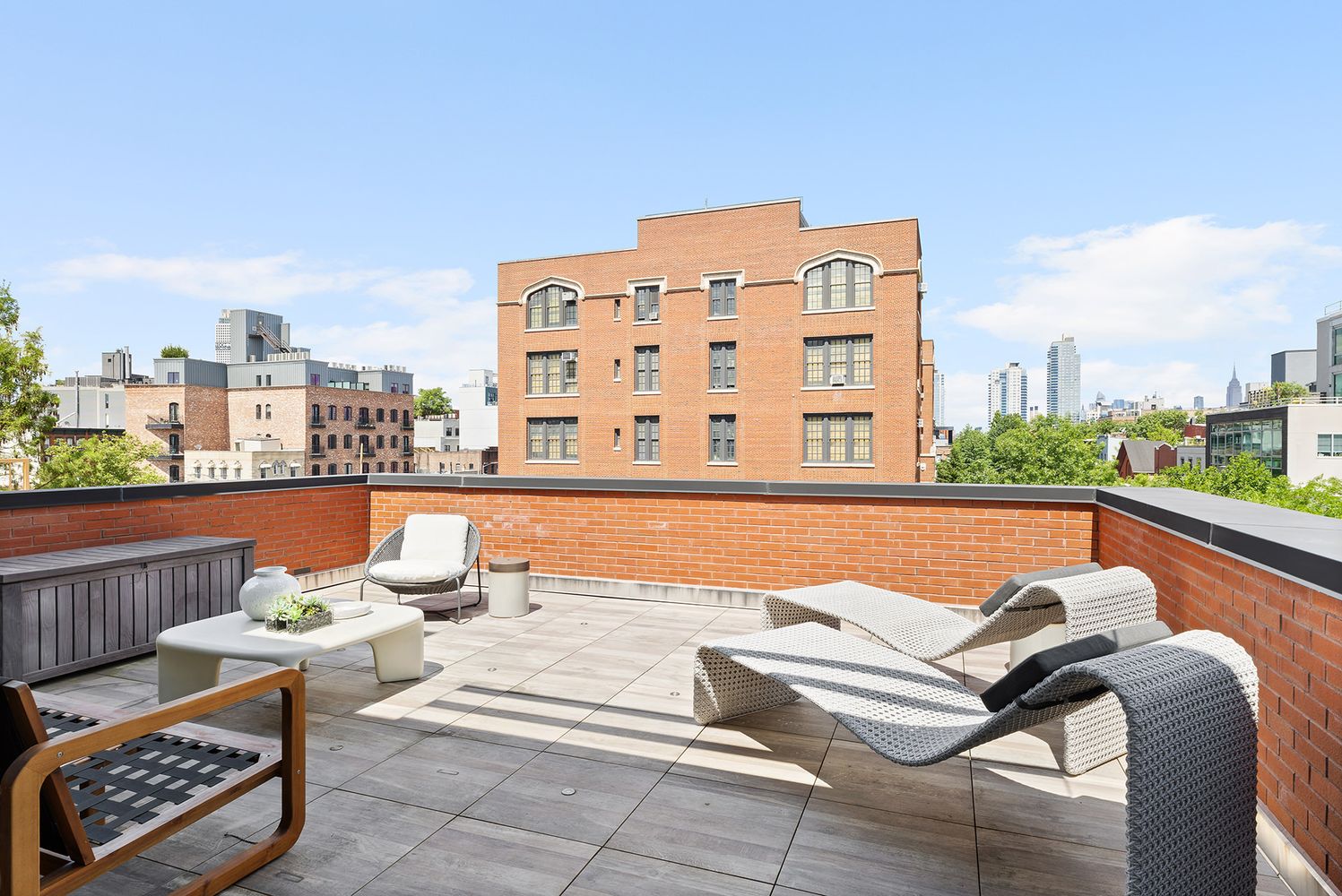 a view of roof deck with city view