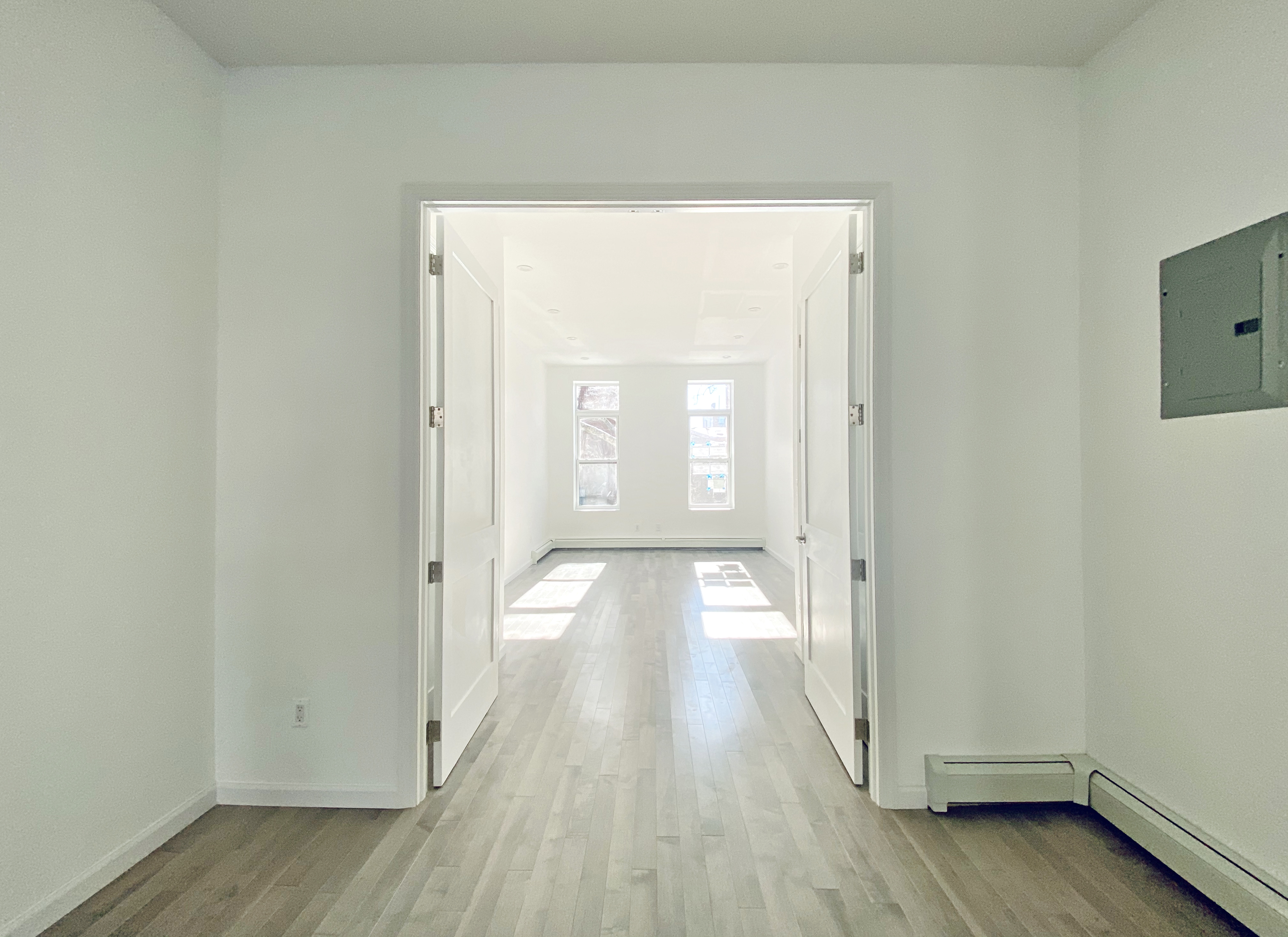 175 Luquer Street, Unit 3 Brooklyn, NY 11231 - Photo 8 of 12 a view of a room with wooden floor and window