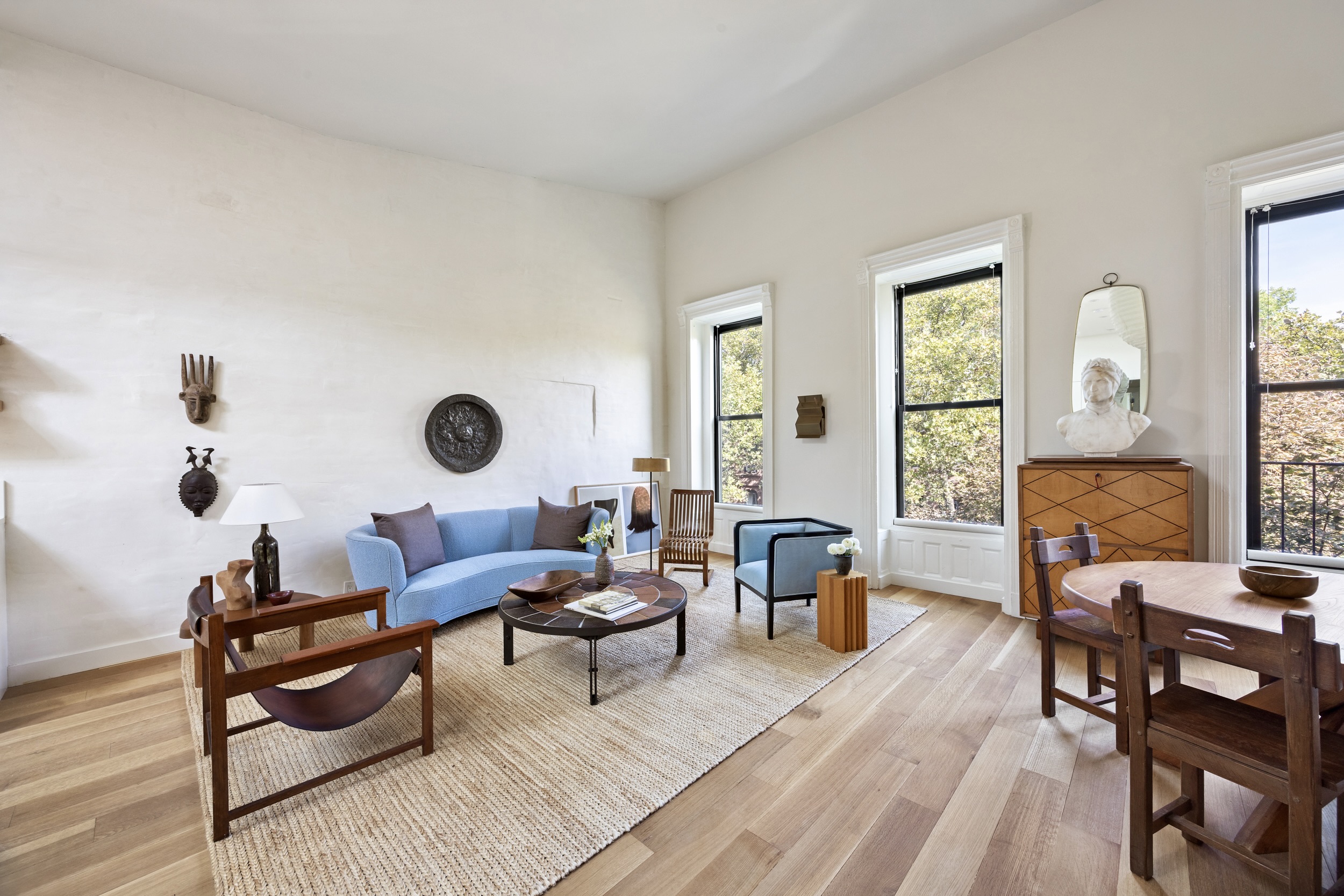 134 Berkeley Place, Unit 3 Brooklyn, NY 11217 - Photo 2 of 30 a living room with furniture and wooden floor