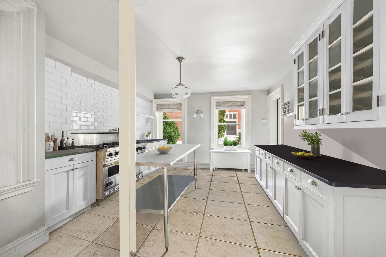 a kitchen with stainless steel appliances kitchen island granite countertop a sink and cabinets