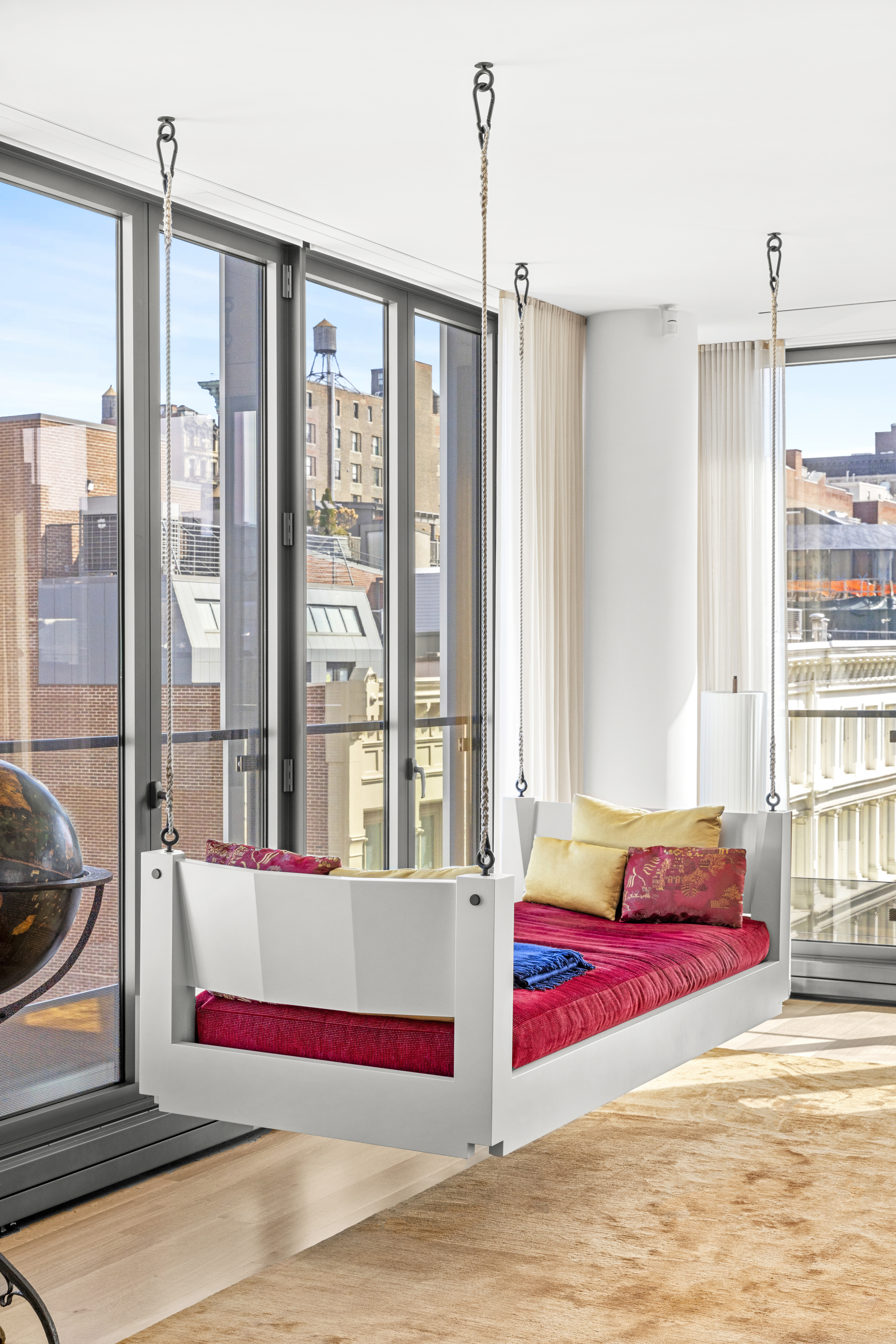 27 Wooster Street, Unit PH Manhattan, NY 10013 - Photo 19 of 34 a bedroom with a bed and large windows