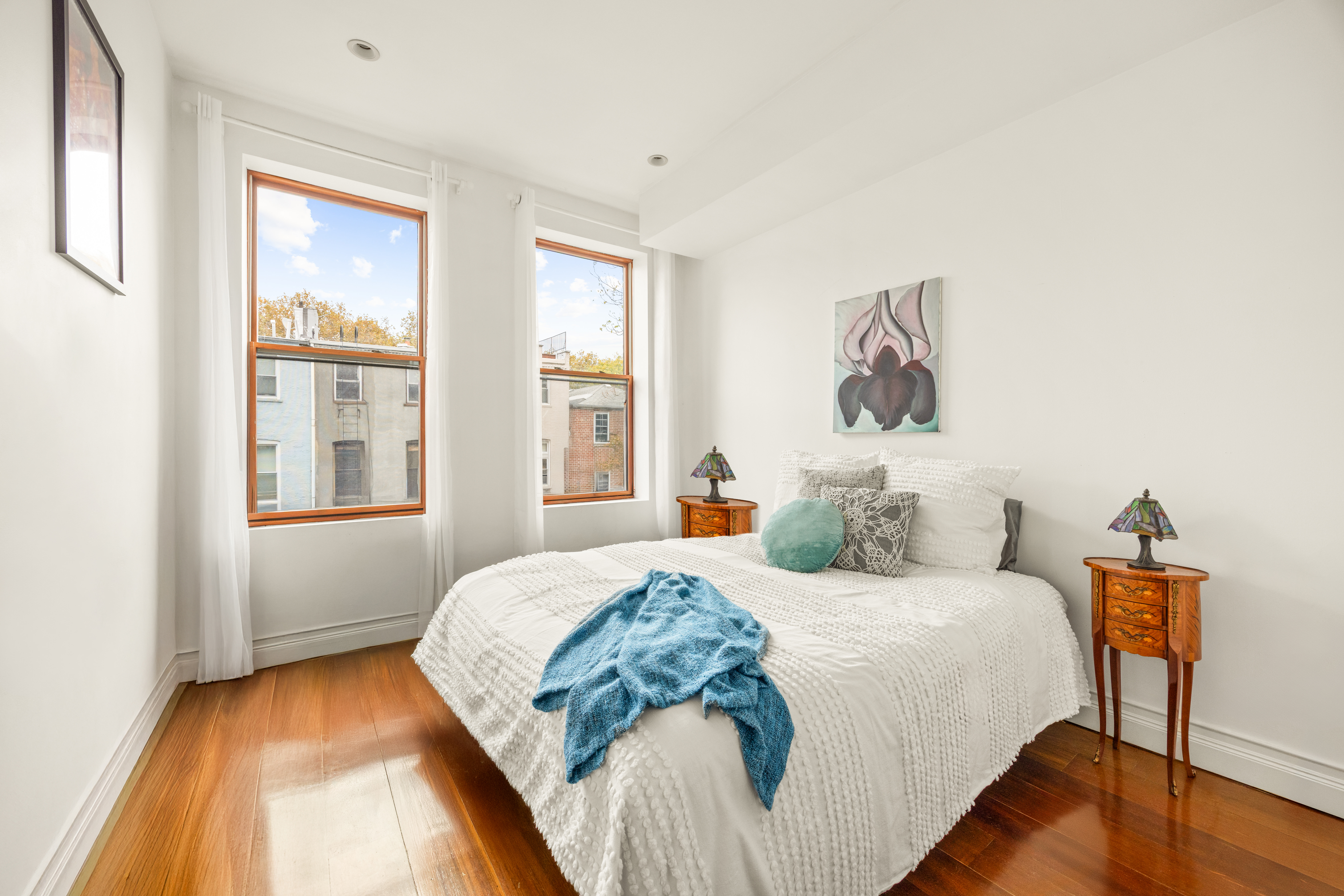 473 Hicks Street, Unit 3 Brooklyn, NY 11231 - Photo 8 of 11 a bedroom with a large bed and a window